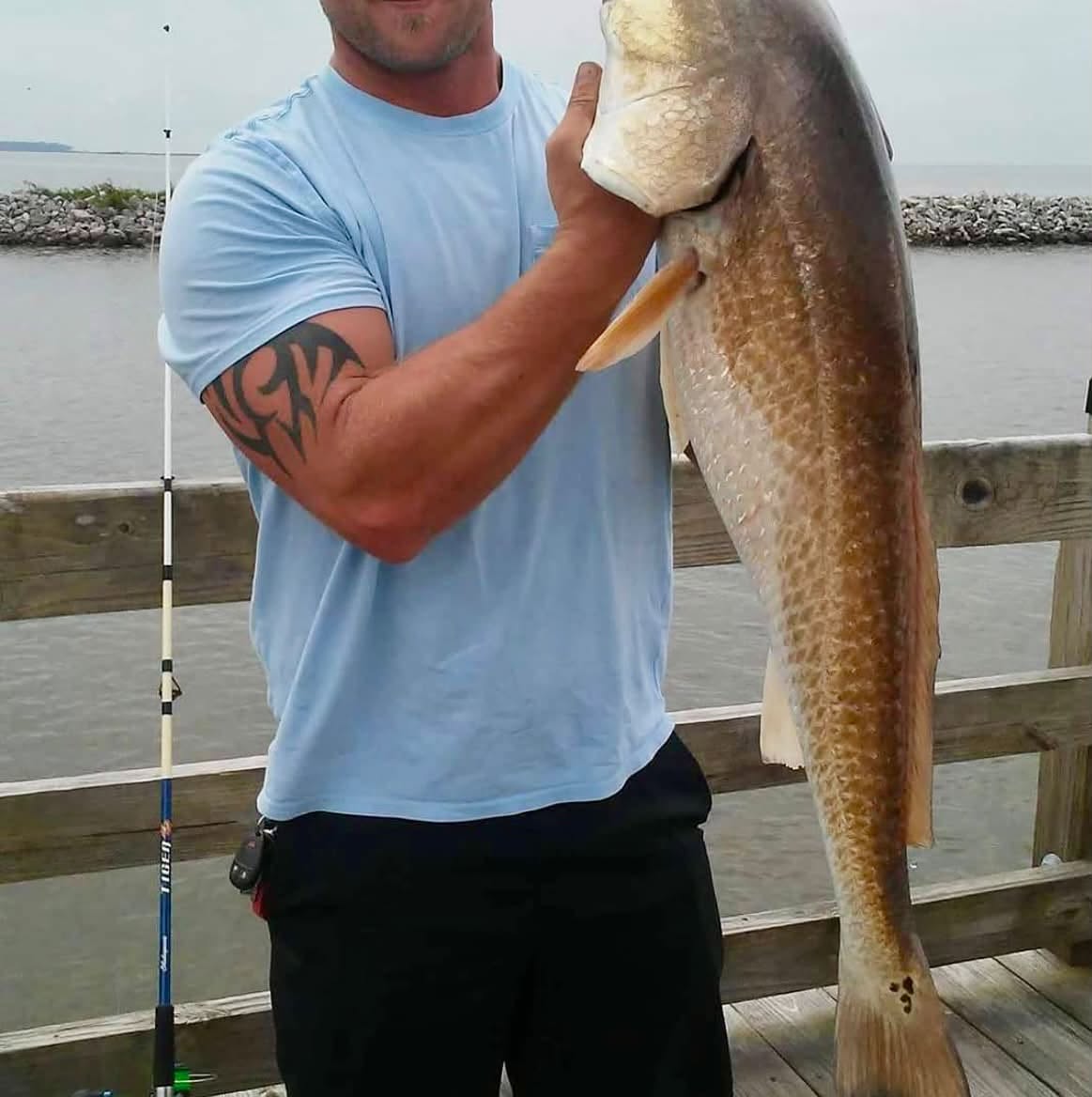 Jason McGinnis with a bull redfish