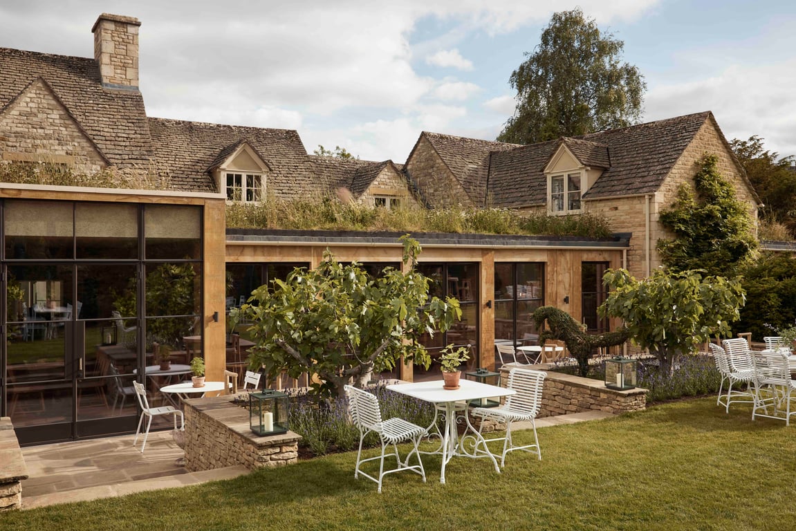Garden terrace and stone exterior at The Fox at Oddington
