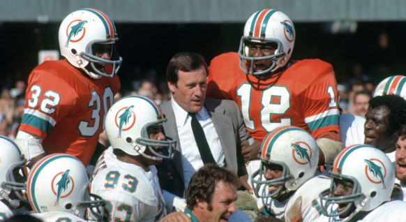 Miami Dolphins head coach Don Shula being carried off the field after Super Bowl VII