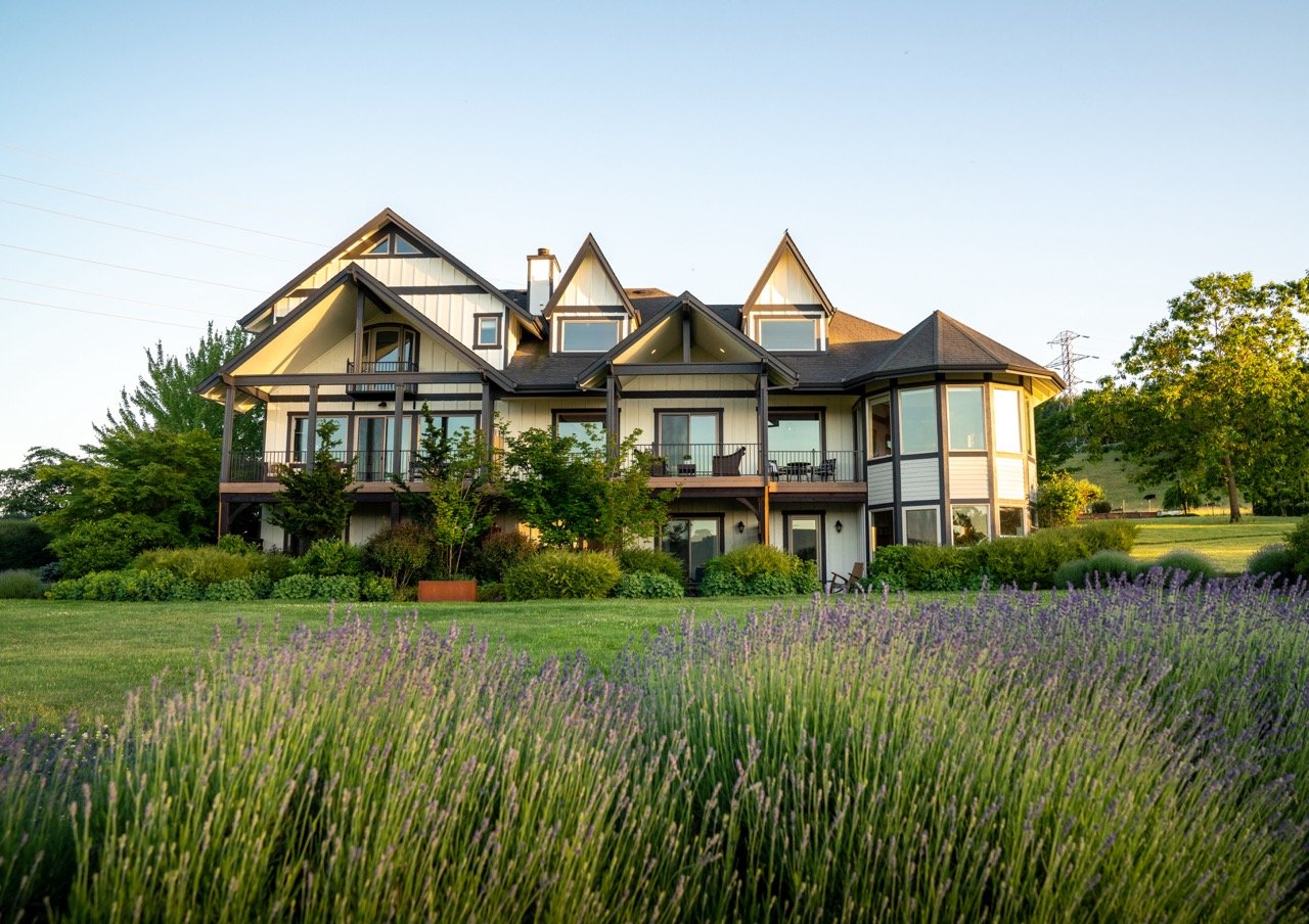 The Setting Inn framed by lavender and landscaped gardens
