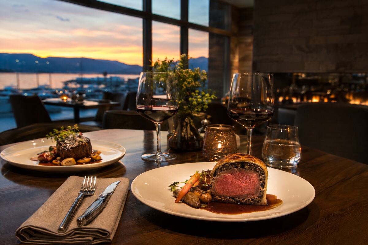 Elegant beef Wellington and steak in a refined riverside dining room