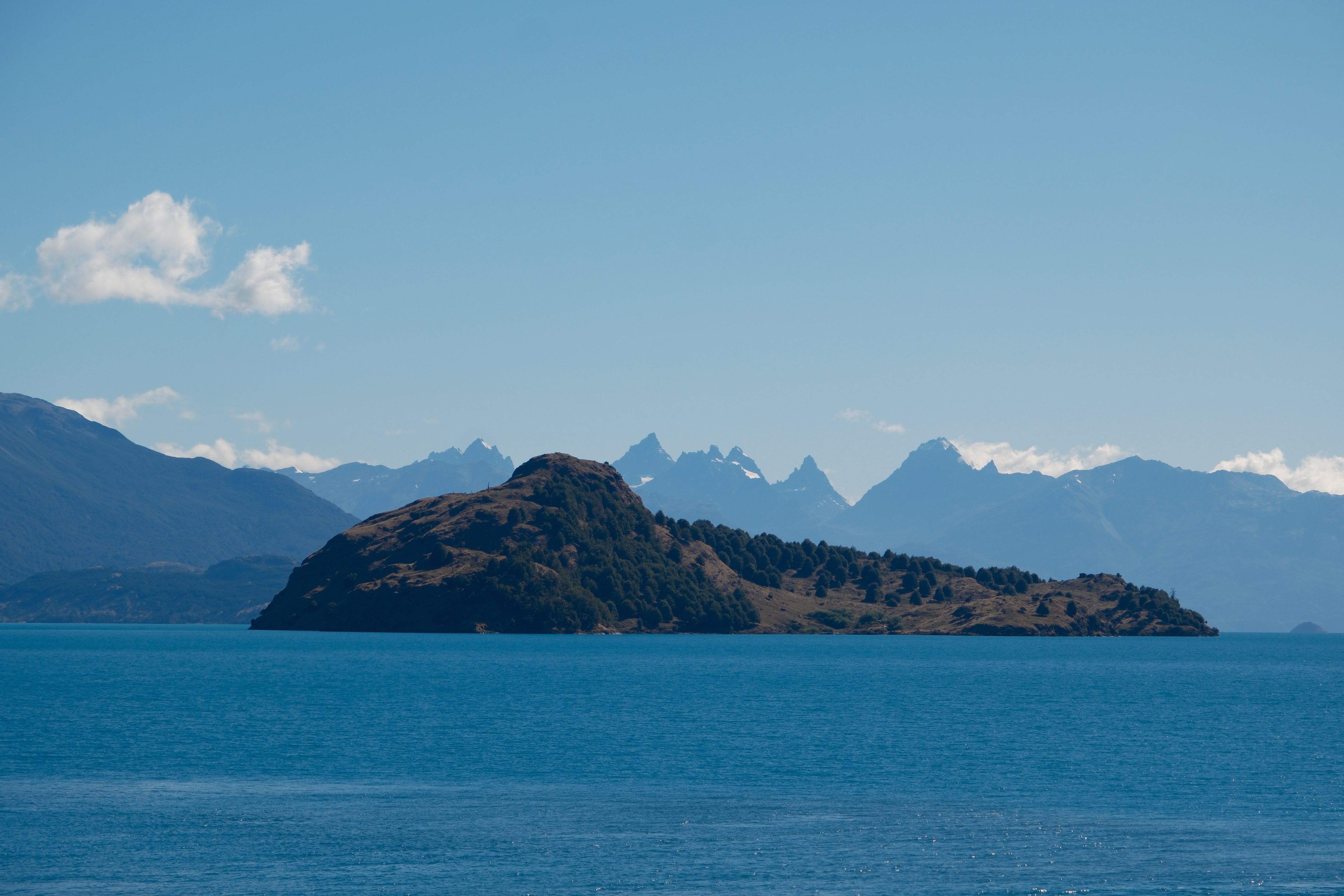 Blue lake and distant mountains in Chilean Patagonia