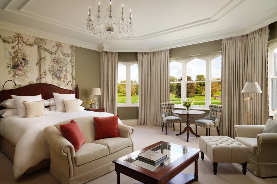 Elegant Adare Manor guest room overlooking the grounds