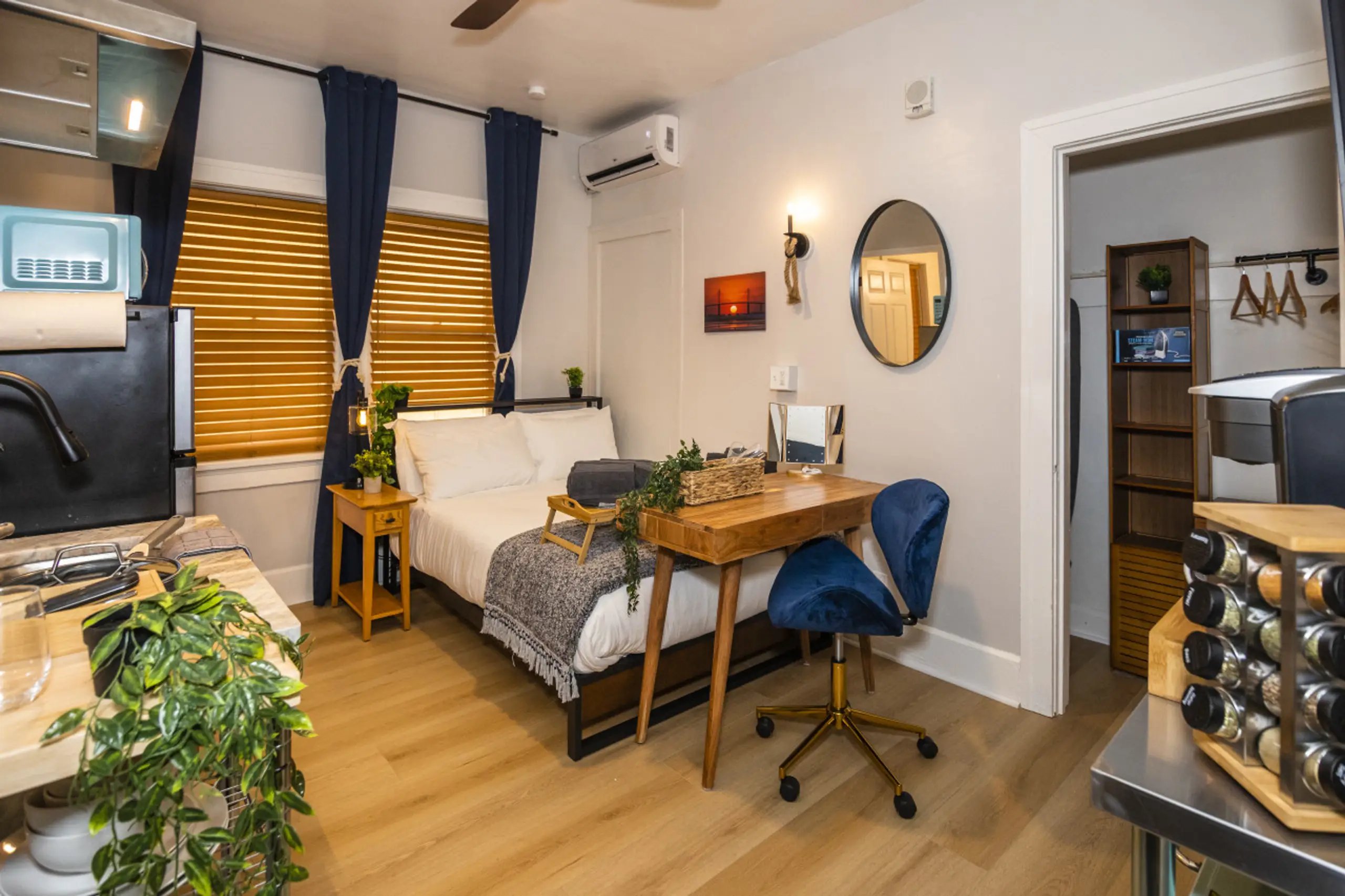 Apartment-style suite with a kitchen and dining table at The 1888 Hotel