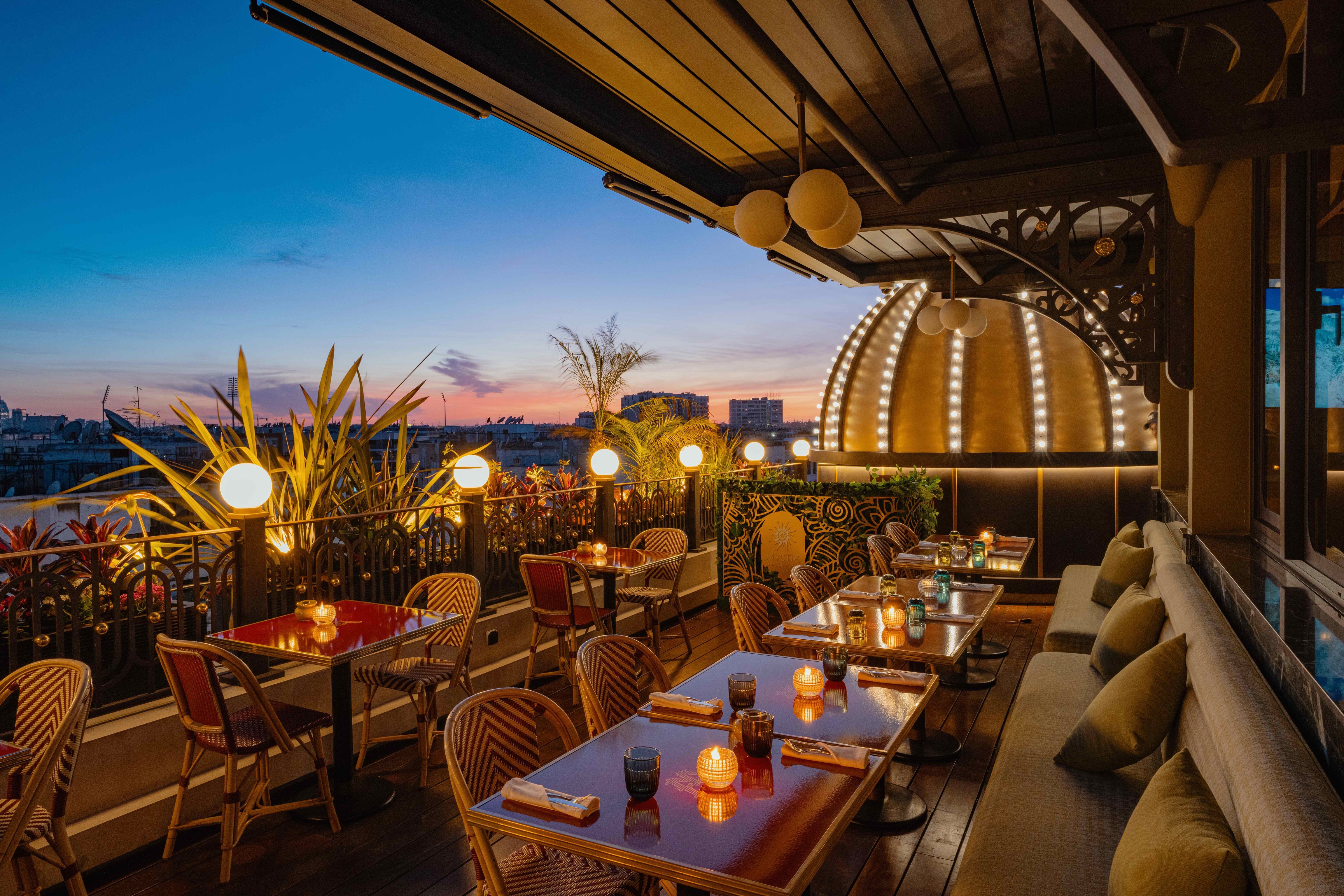 Rooftop dining at sunset at Marly Boutique Hotel