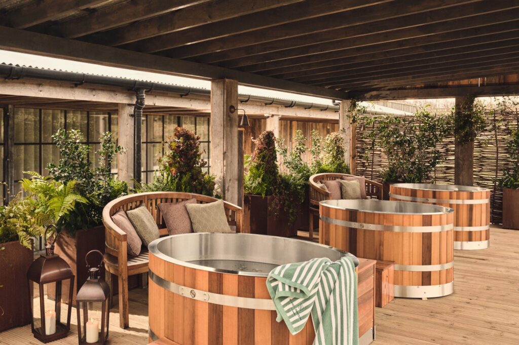 Wooden outdoor soaking tubs at Soho Farmhouse