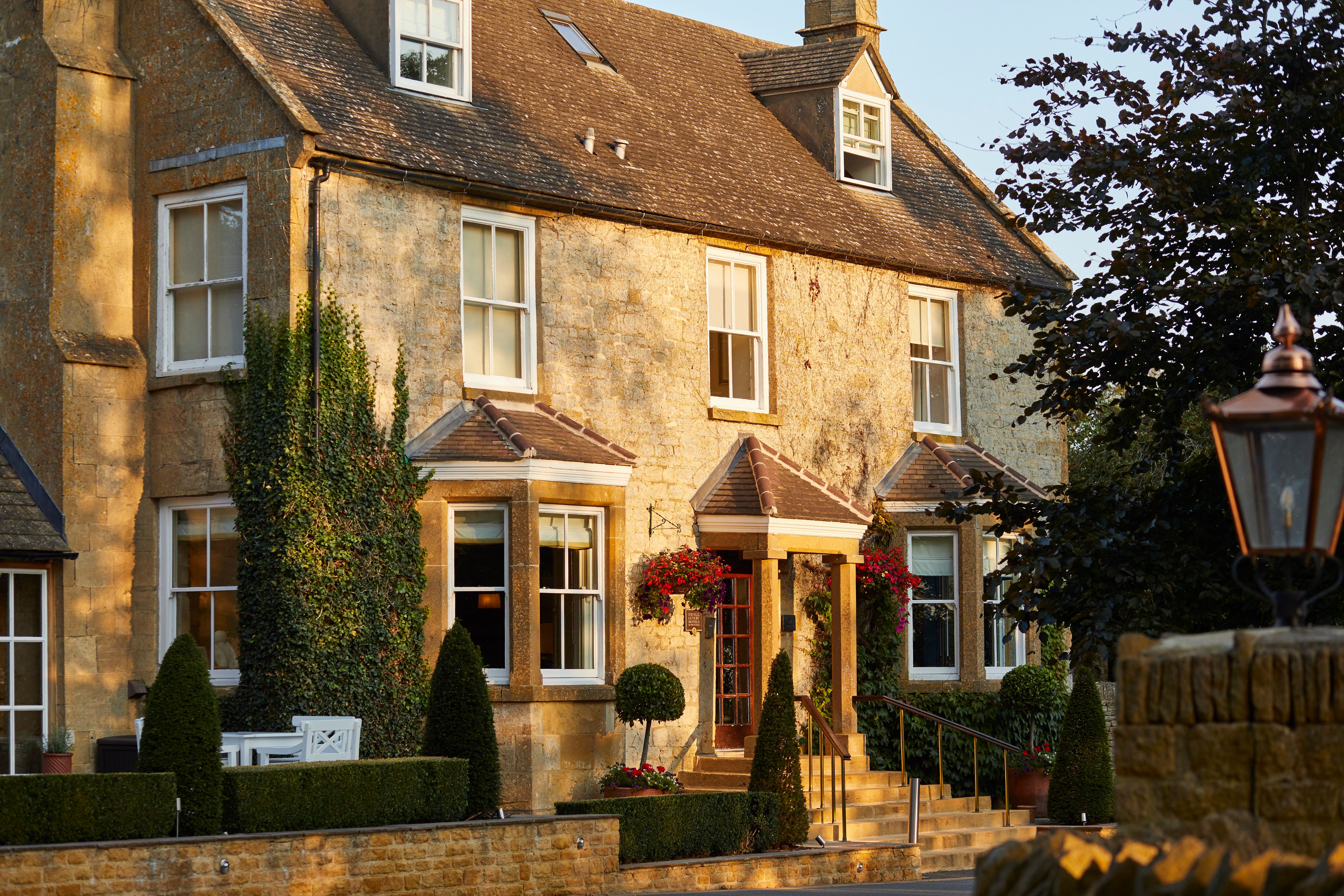 Stone farmhouse exterior of Dormy House in the Cotswolds