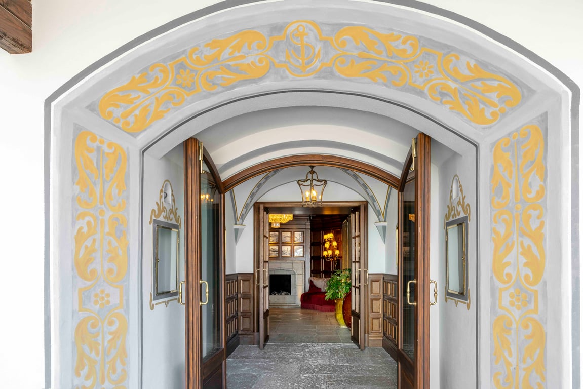 Decorative arched entry corridor at Hotel Ancora