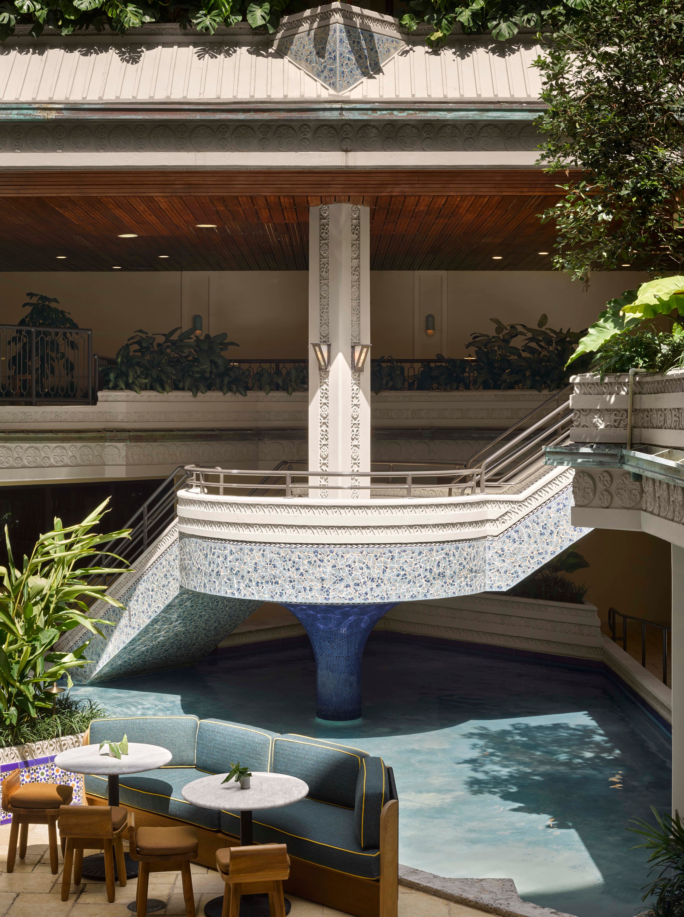 Lush courtyard and fountain at Mayfair House Hotel and Garden
