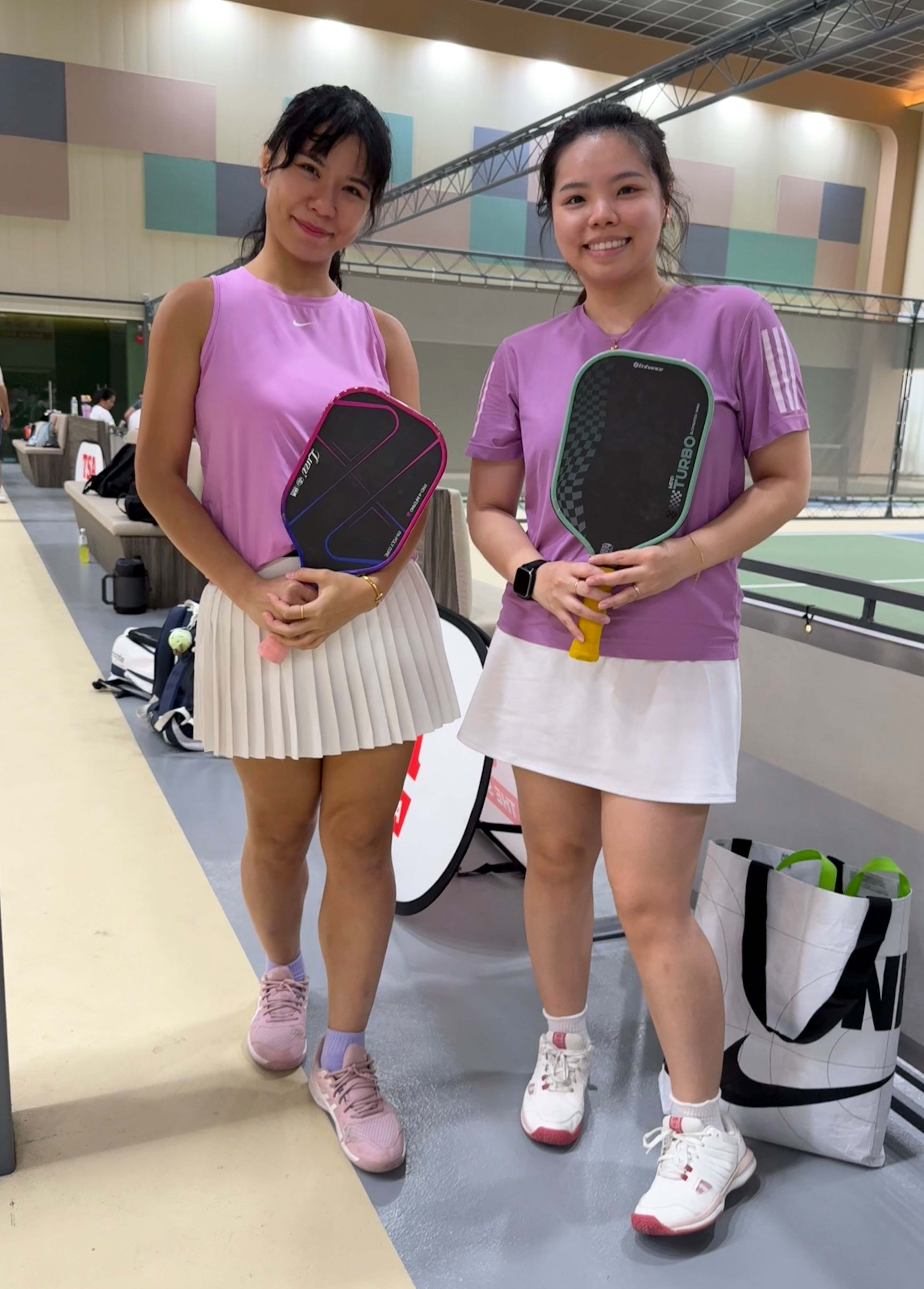 Ashley &amp; Wee Qian (right), both pwetty in pink