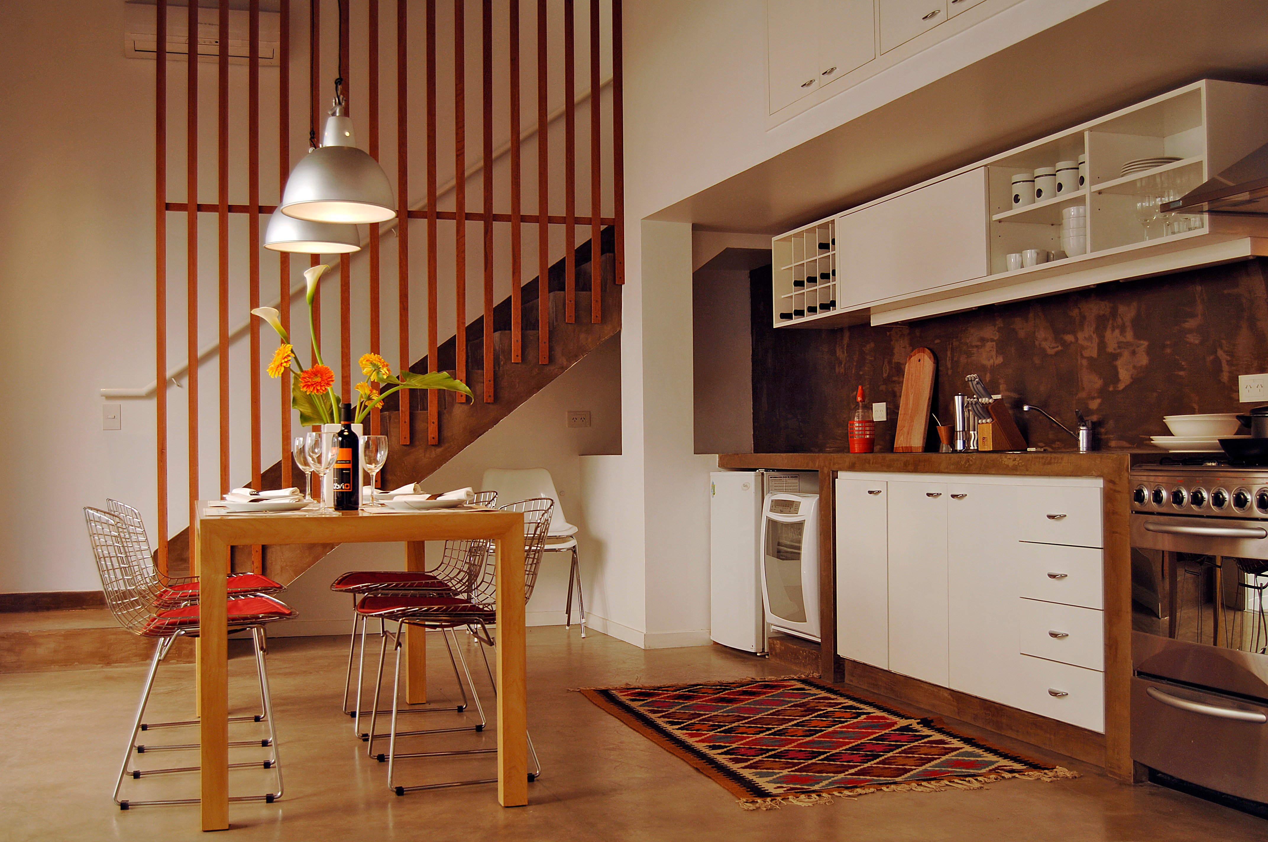 Loft kitchen and dining area at Home Hotel