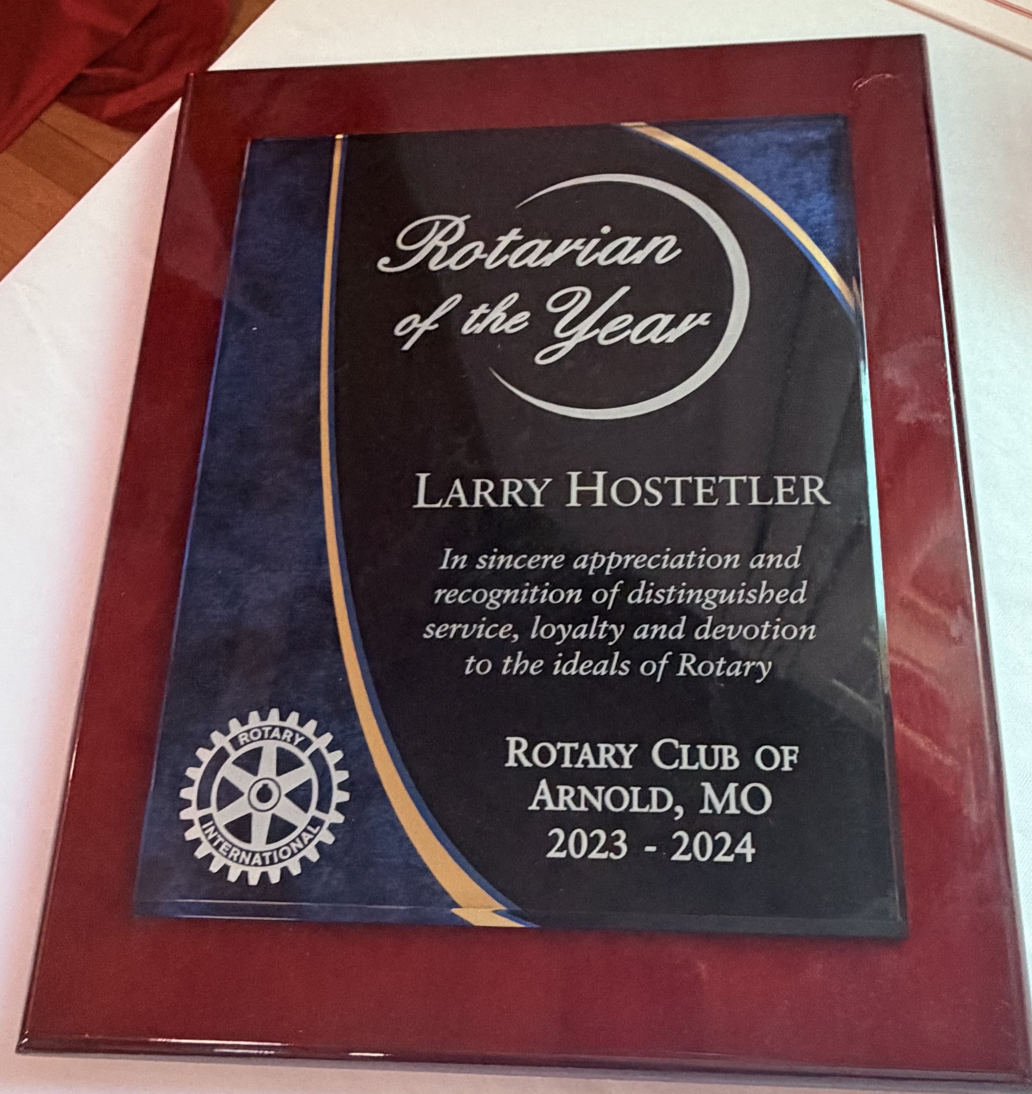 Rotarian of the Year plaque honoring Larry Hostetler