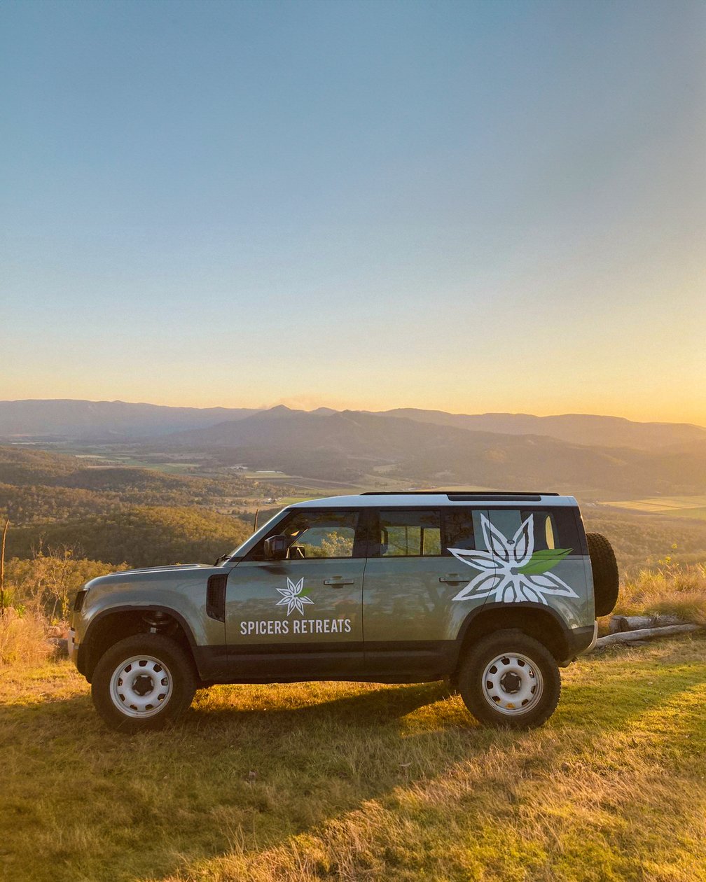 Off-road vehicle overlooking the rolling landscape at Spicers Hidden Vale