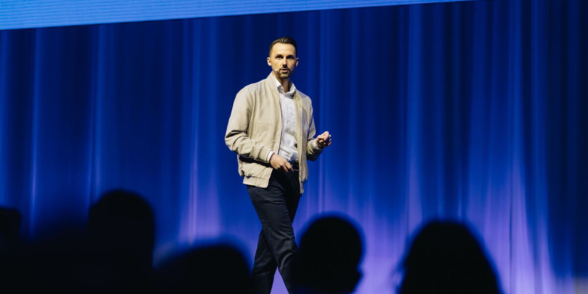 Manuel Bohnet speaking at an AWS event
