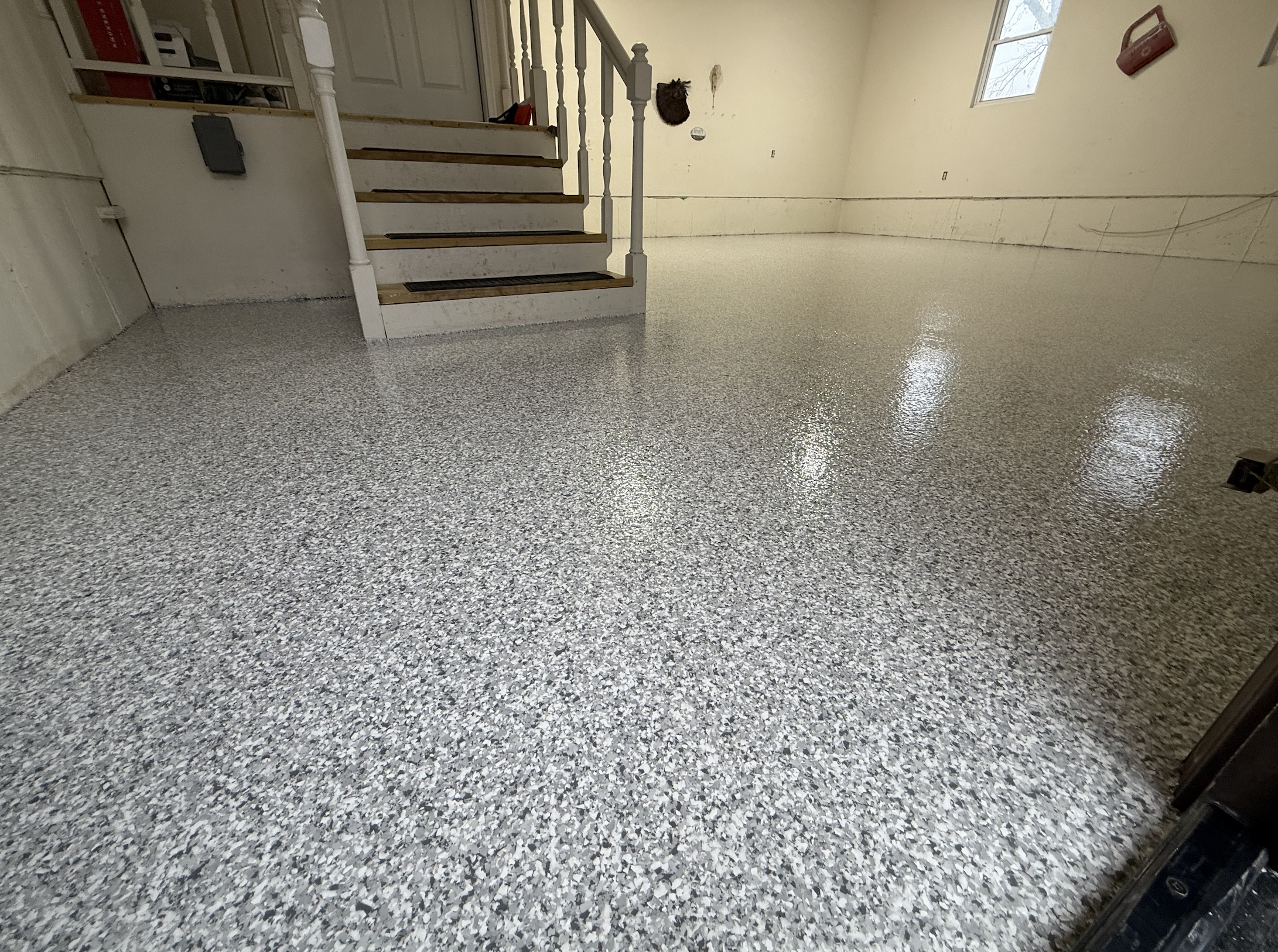 Finished basement renovation with stairs