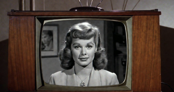 Classic black and white TV showing I Love Lucy