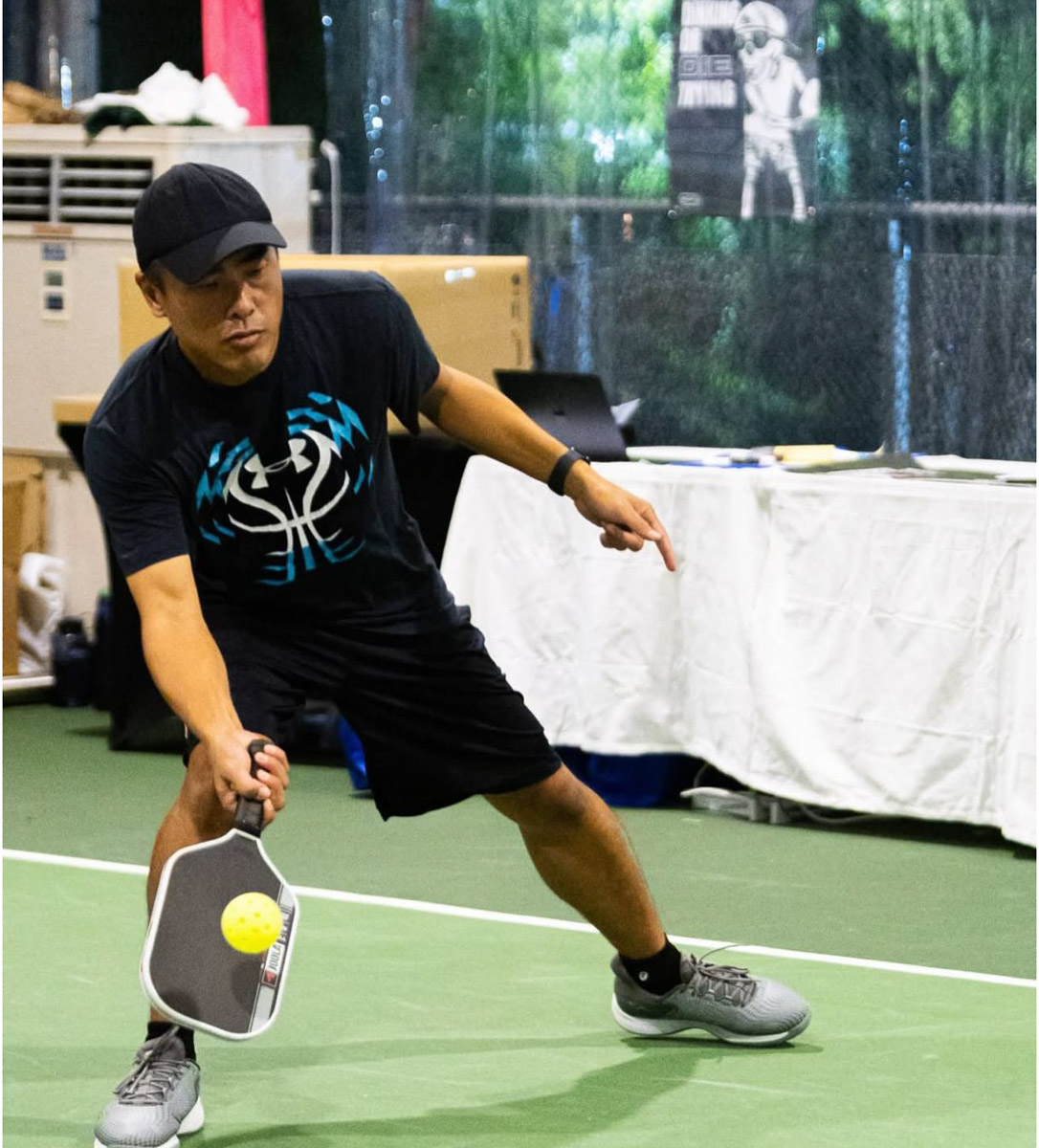 Wei Khai fell in love with Pickleball after attending a Daniel Moore clinic. 