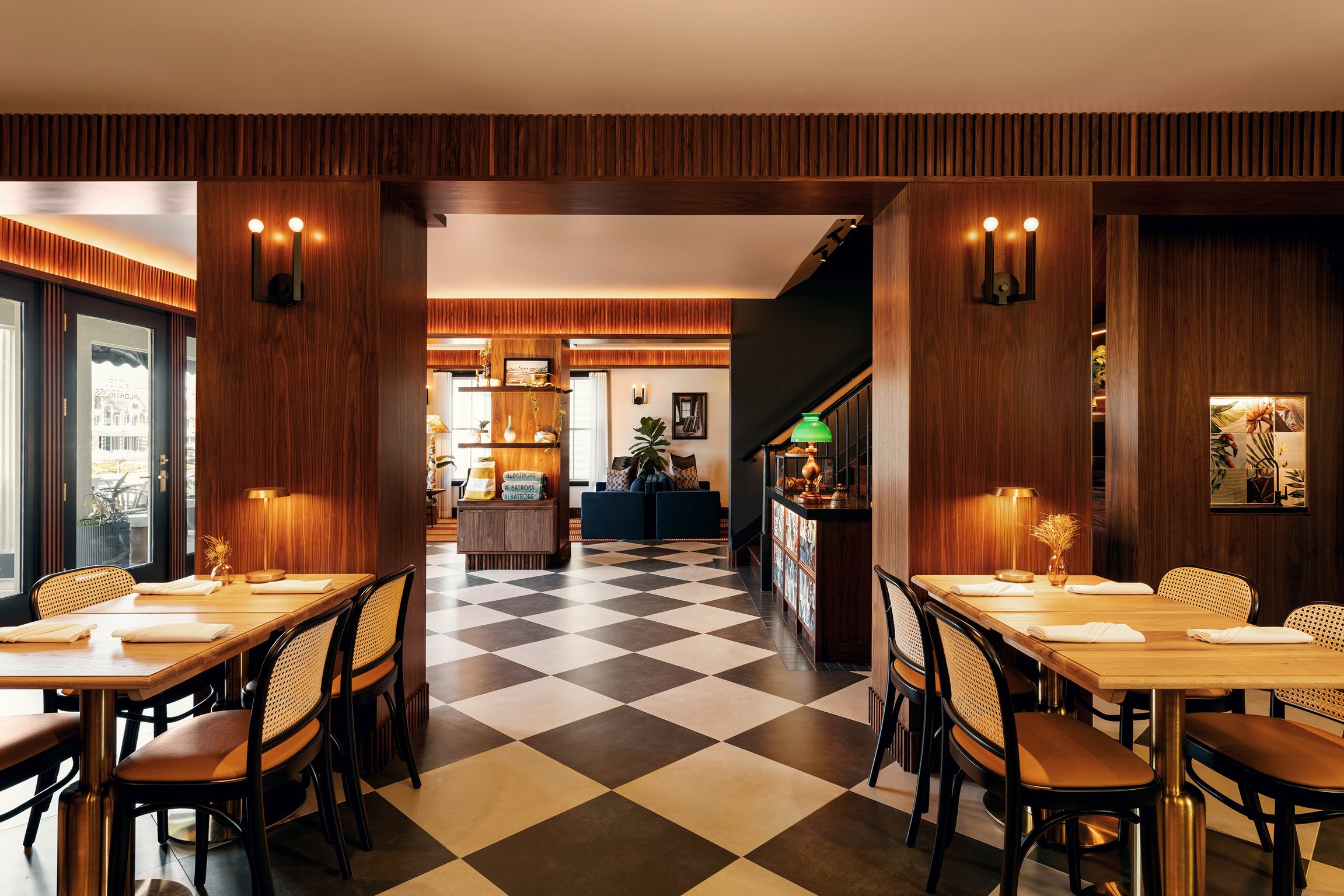 Checkerboard-floor cafe and dining area at Hotel Albatross