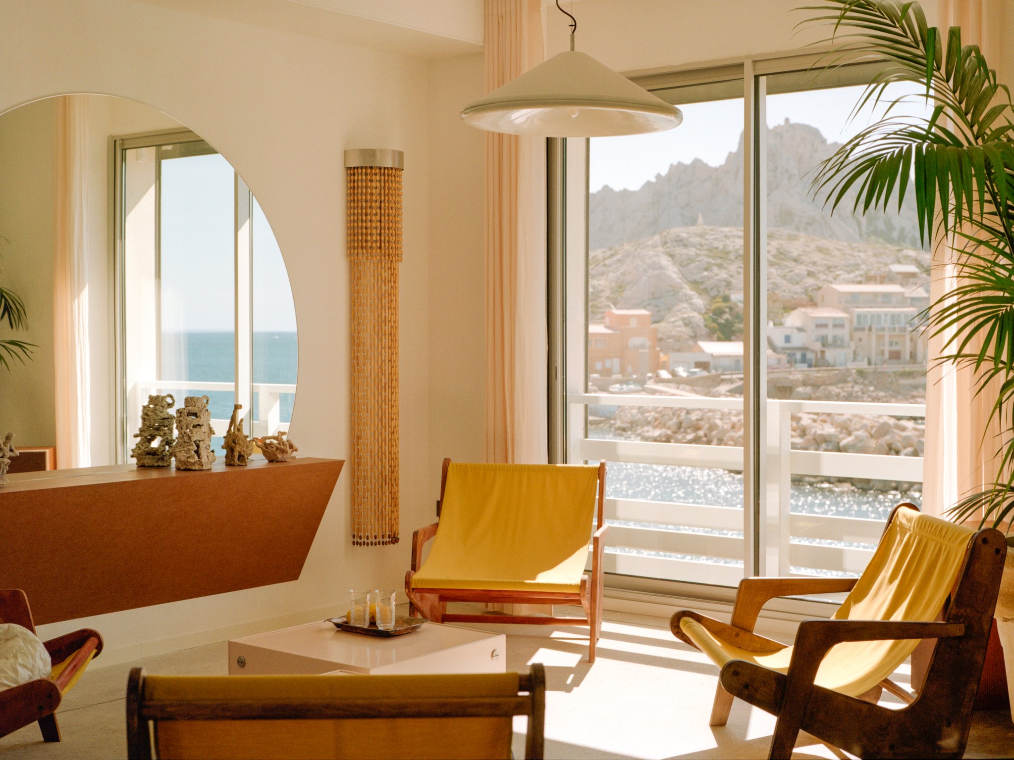 Tuba Club lounge overlooking Marseille's rocky coastline