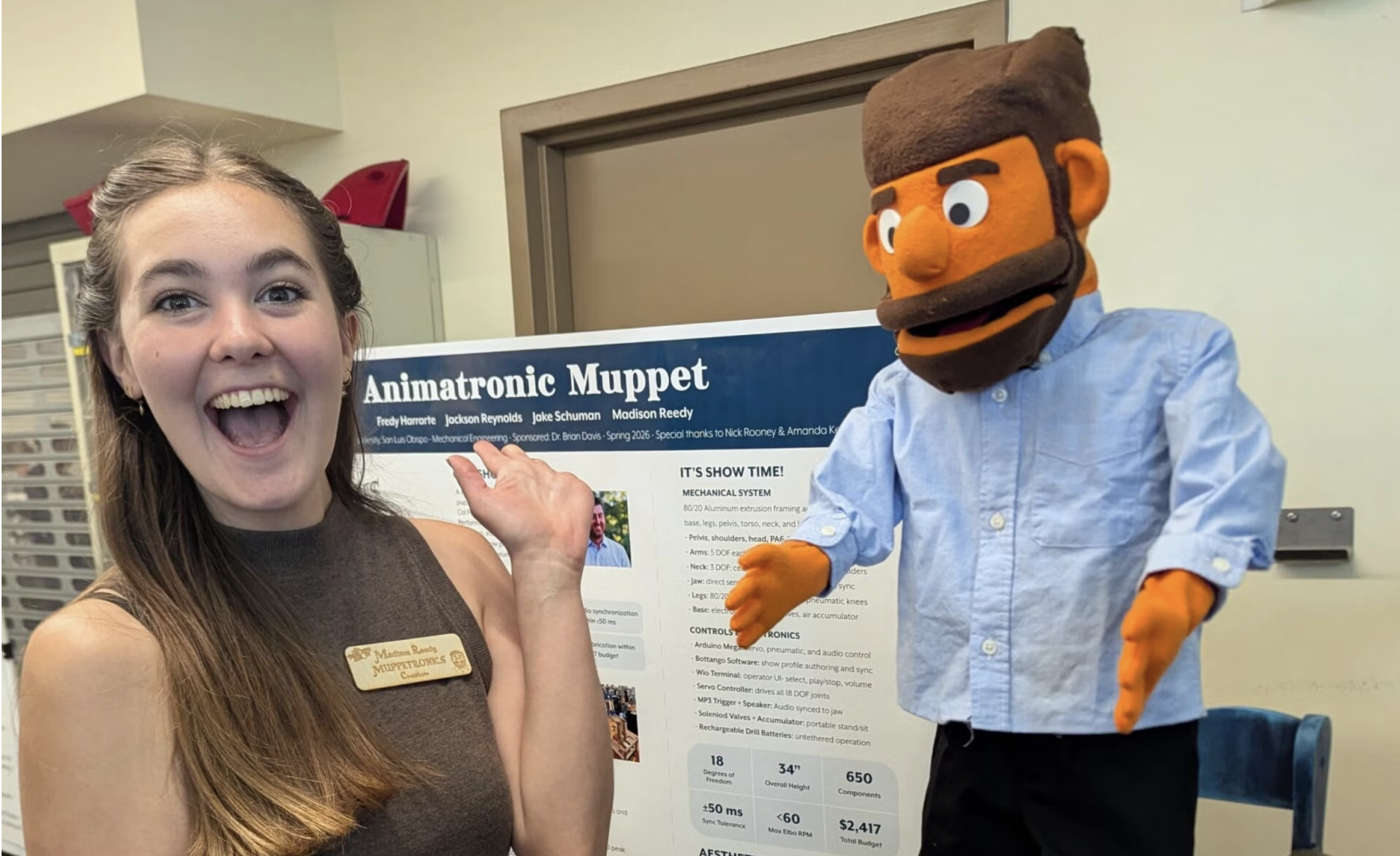 Maddy Reedy with the animatronic Muppet