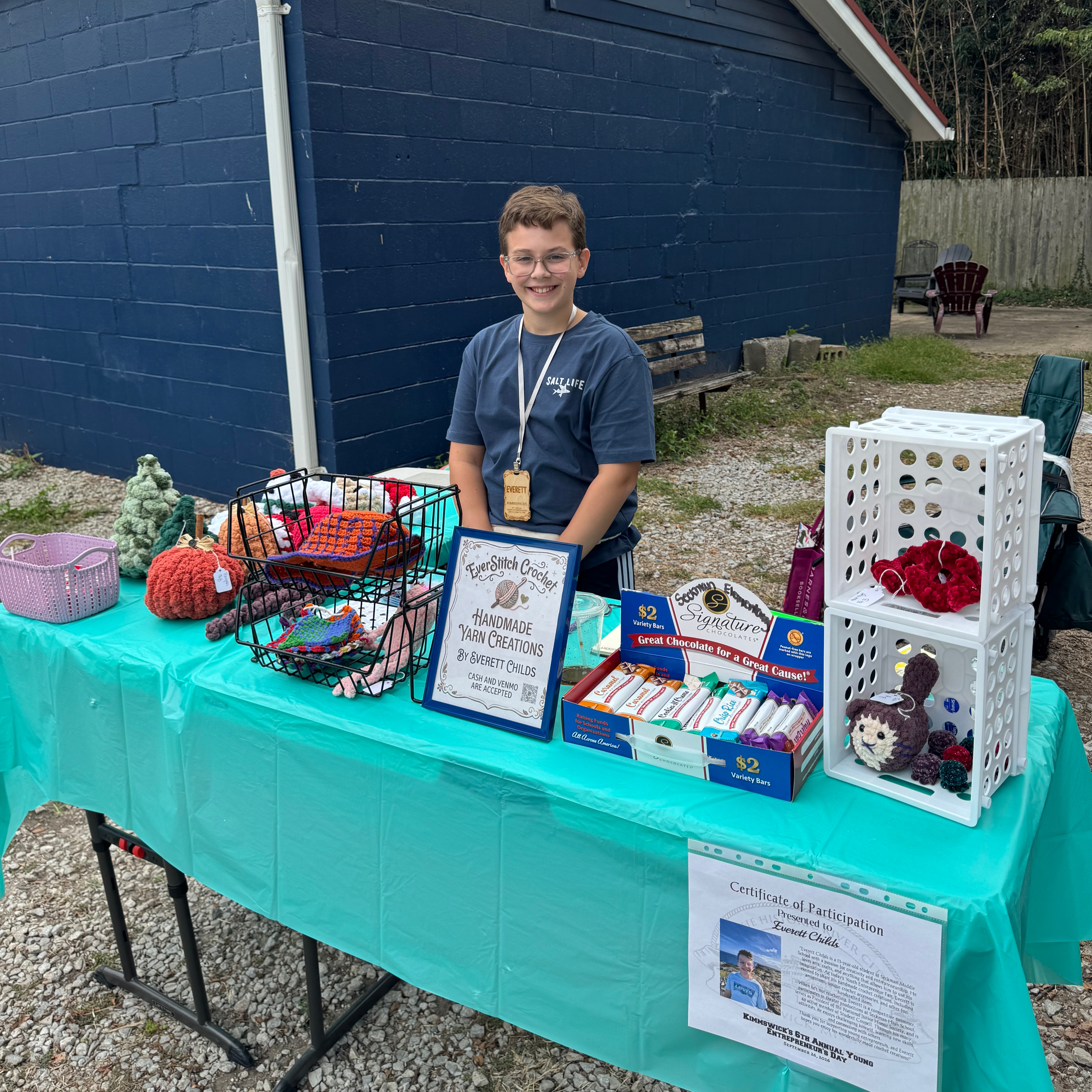 Everett Childs and his handmade crochet items