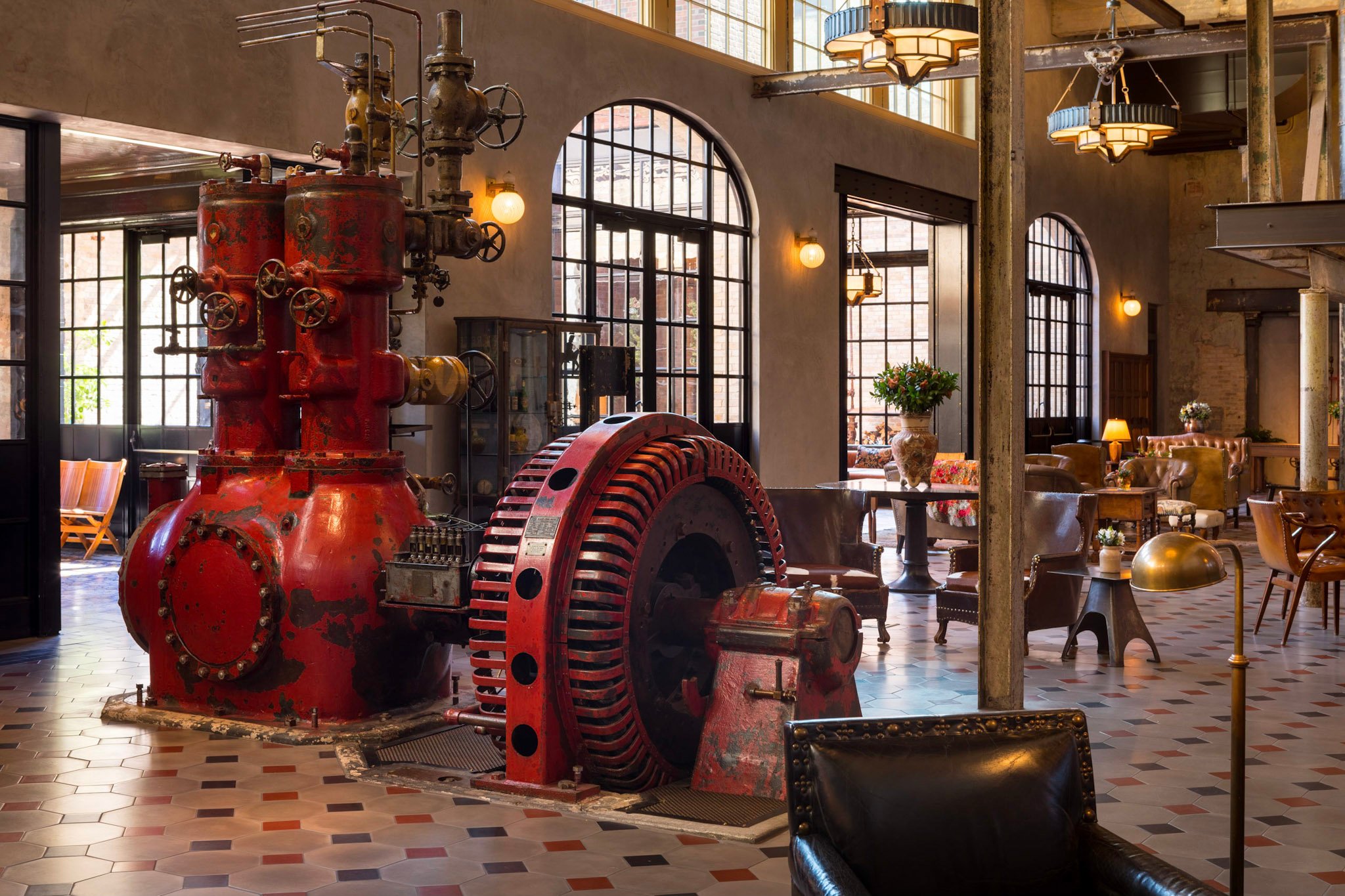 Historic brewery machinery in Hotel Emma’s lobby