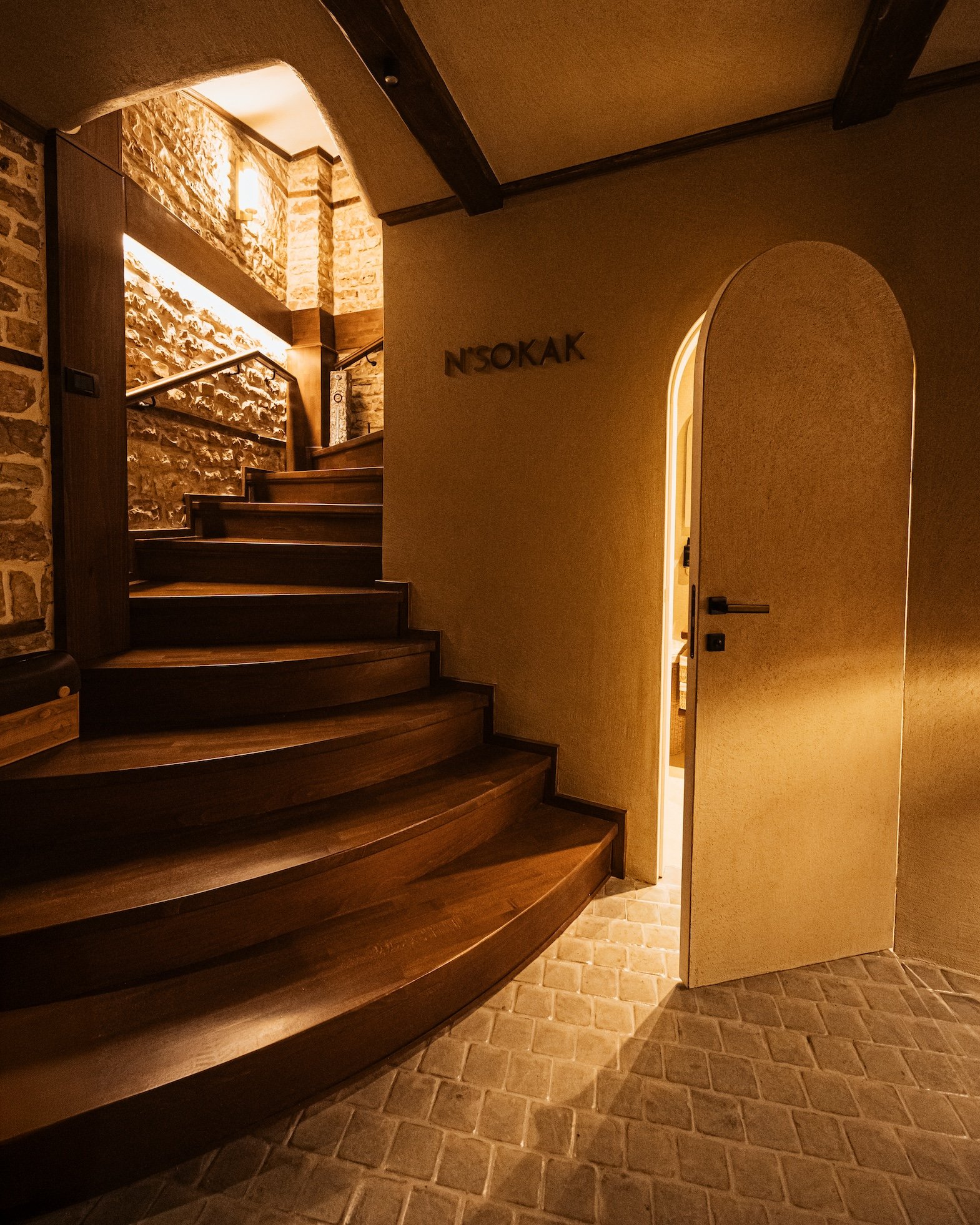 Curved staircase and stone floors at N’Sokak