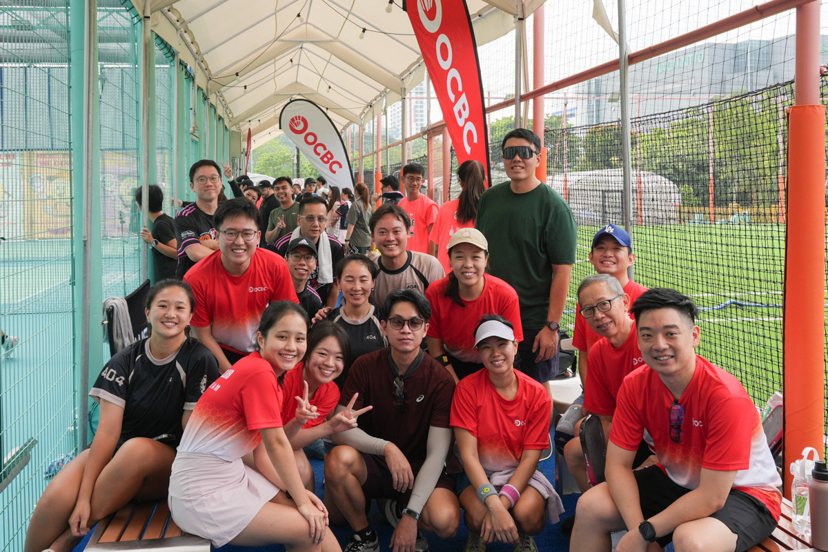 Smiley, happy players...save for the lady in the middle who was probably praying for rain. 