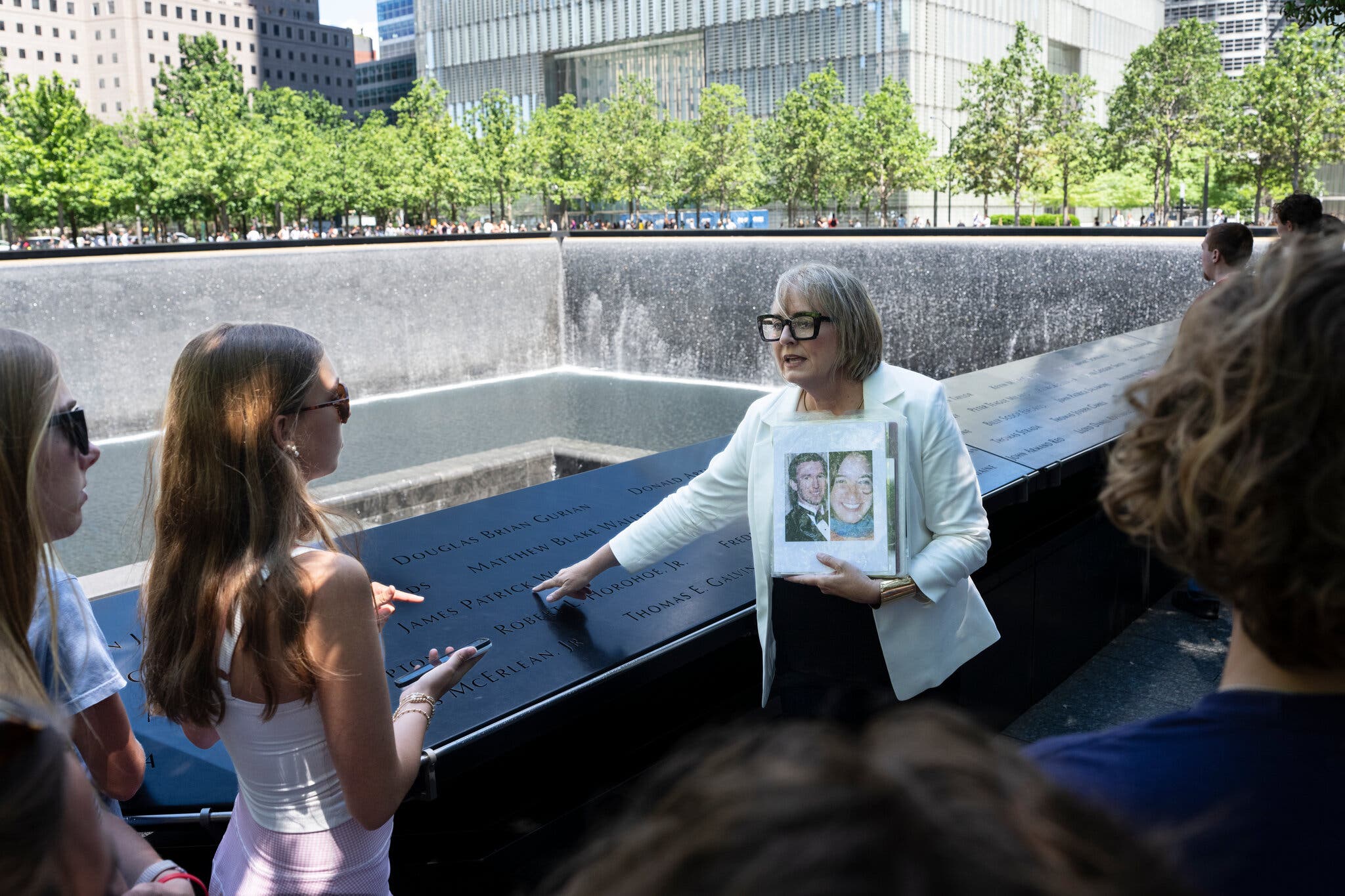 Christina Stanton leading a 9/11 memorial tour in Lower Manhattan