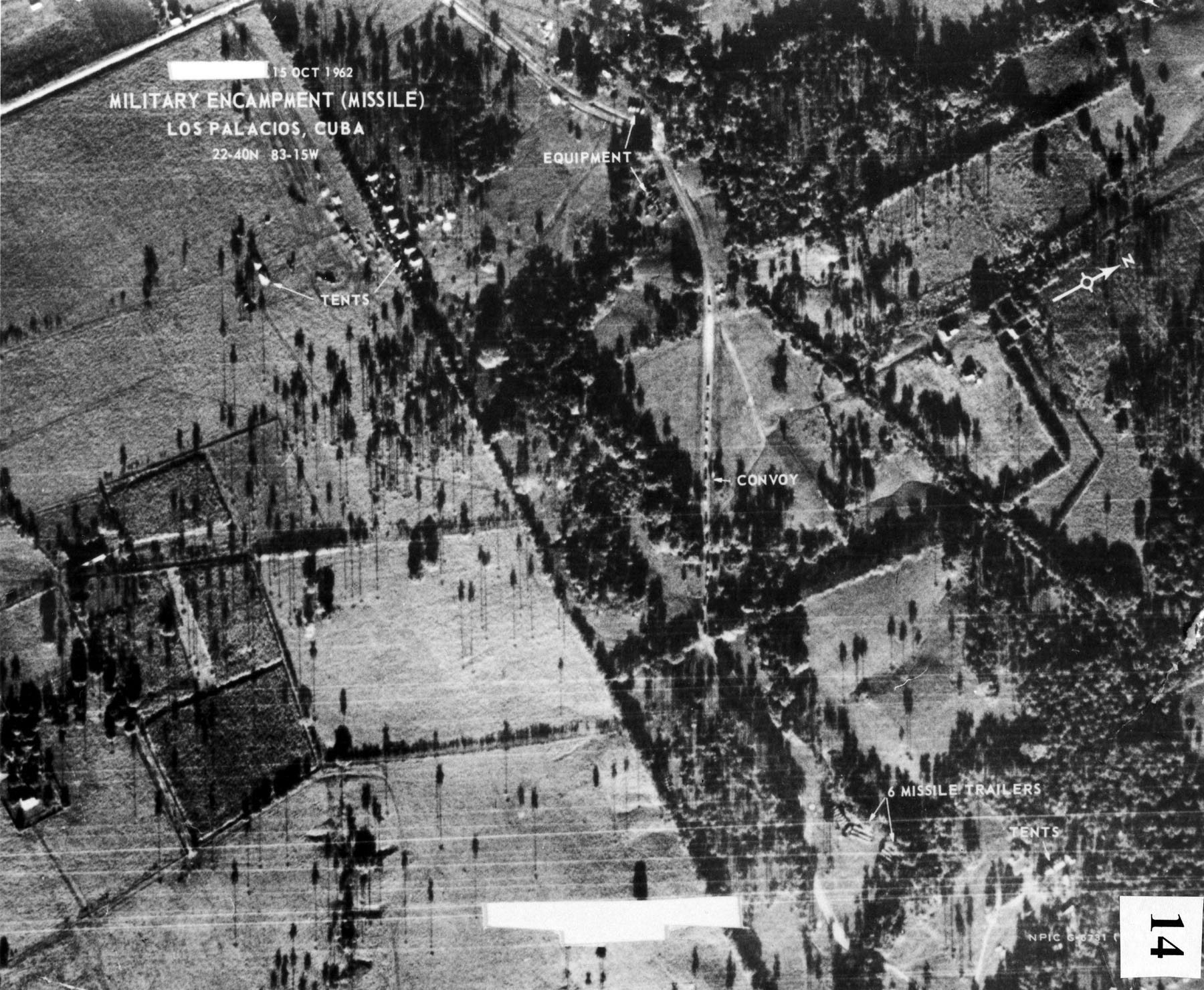 Black and white aerial photograph of a Soviet missile truck convoy near San Cristobal, Cuba, in October 1962