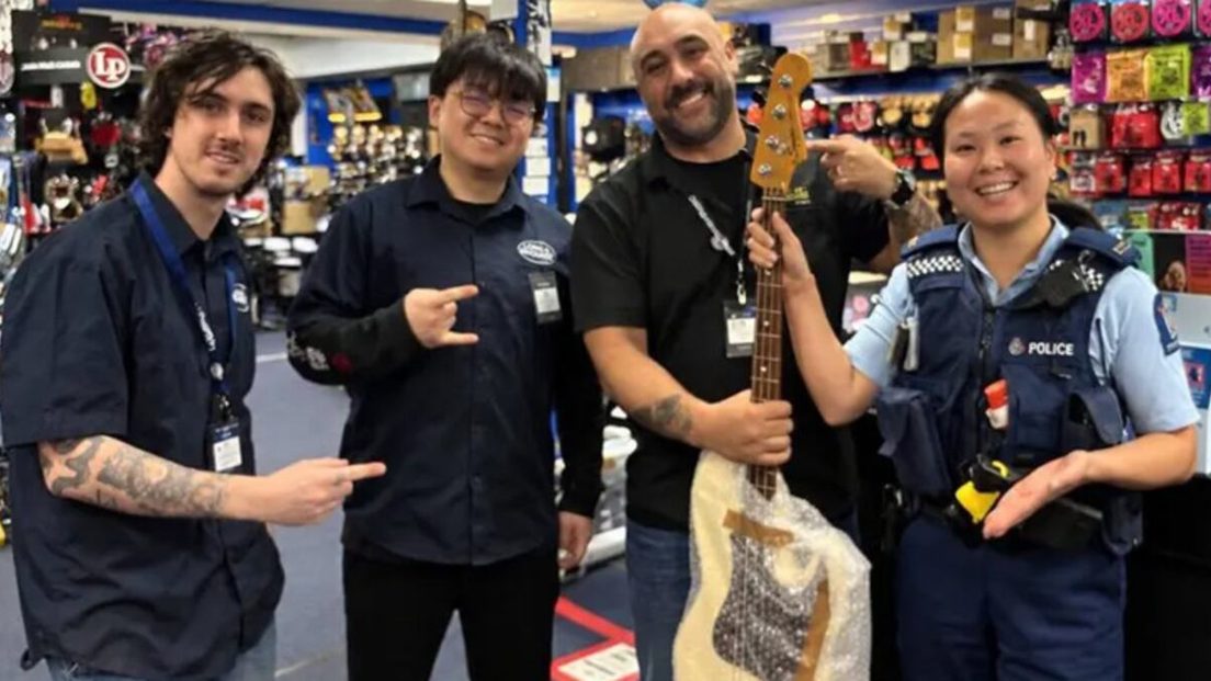 The police photo with the AI-added Squier logo on the recovered bass
