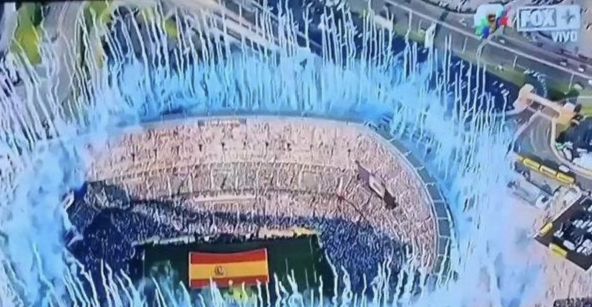 A stadium fireworks show recolored blue to look like a rigged trophy ceremony