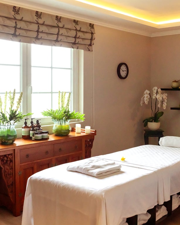 Massage treatment room with garden views at Viceroy Bali