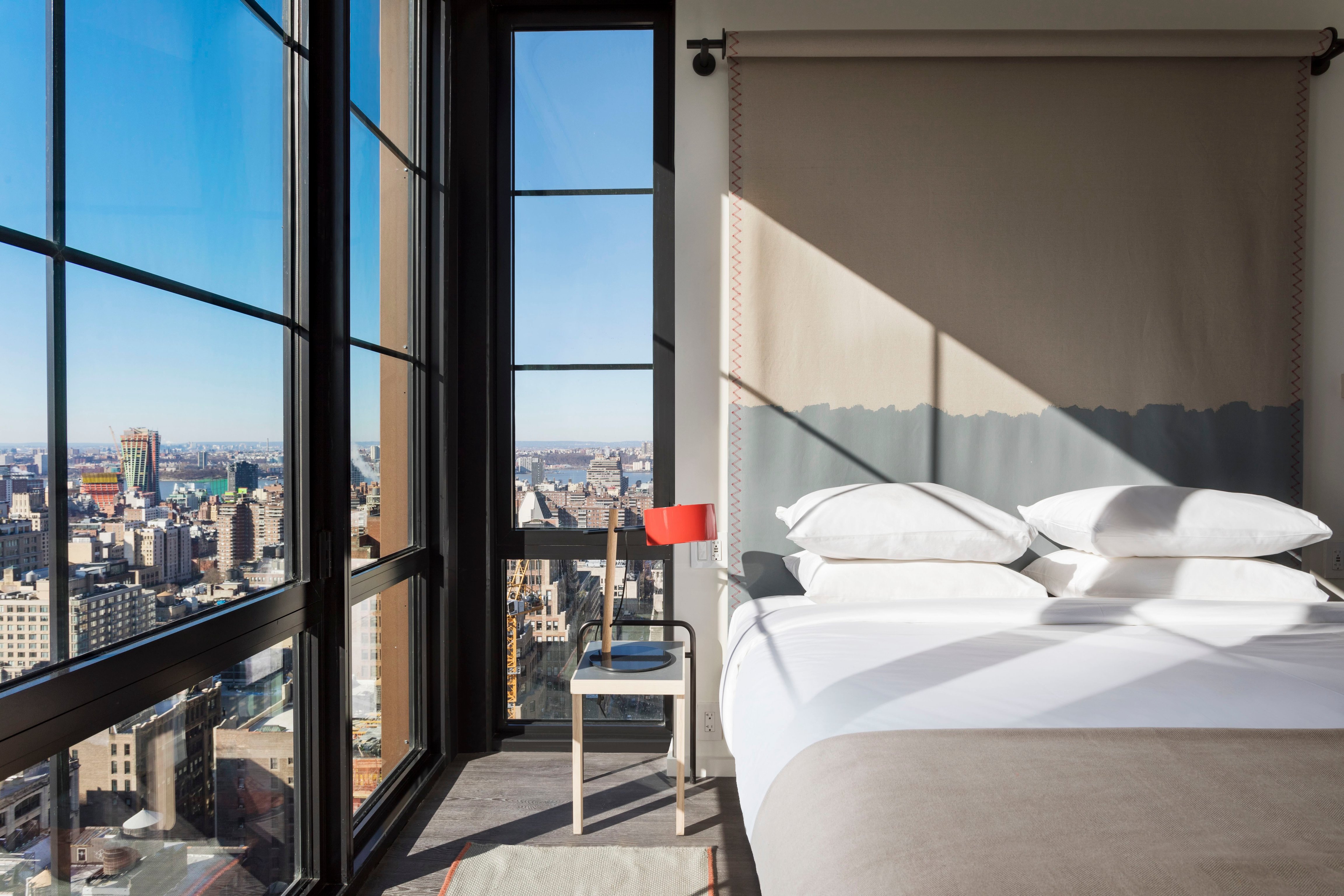 Moxy Chelsea guest room overlooking Manhattan
