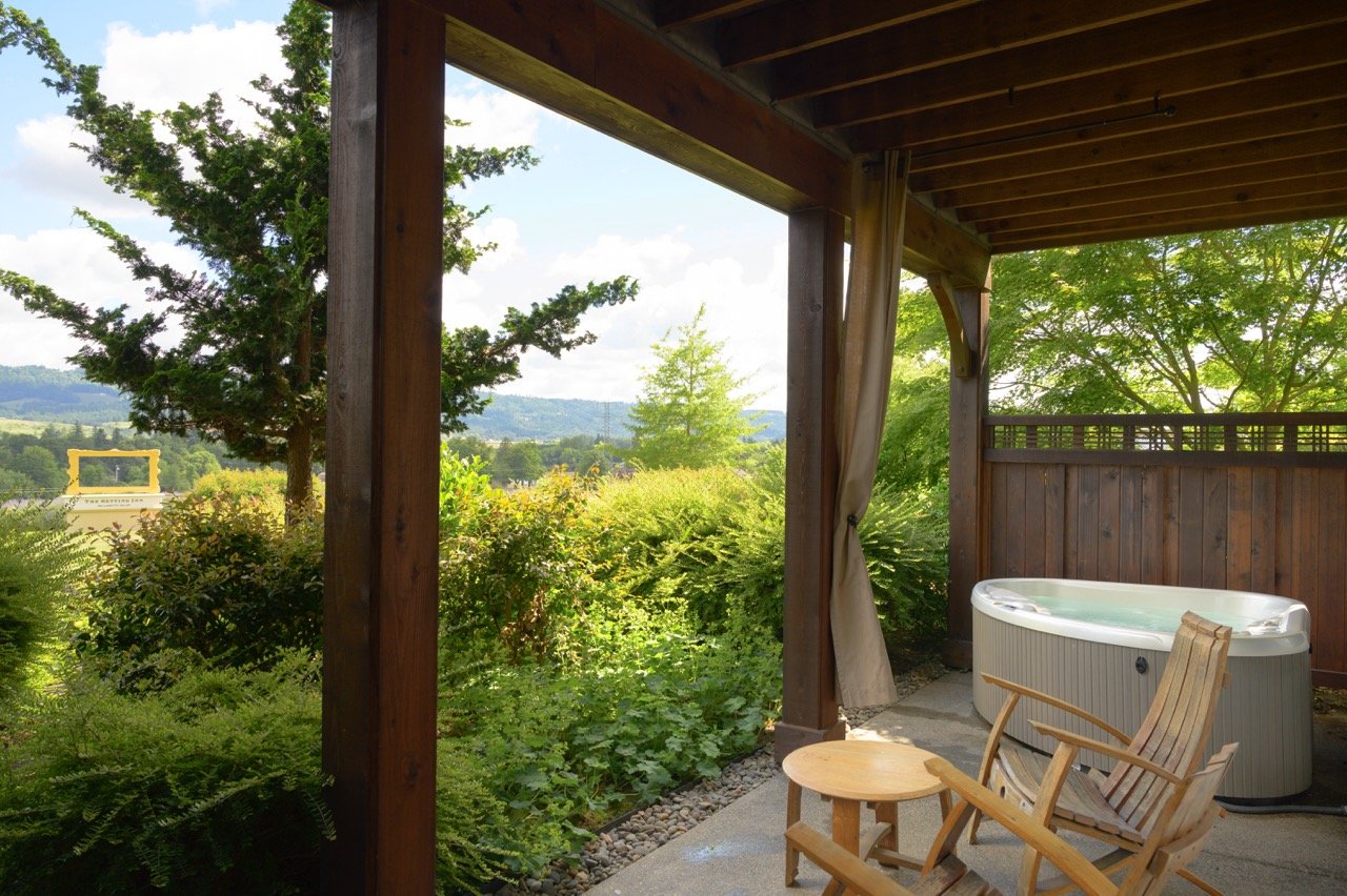 Covered private patio overlooking the garden