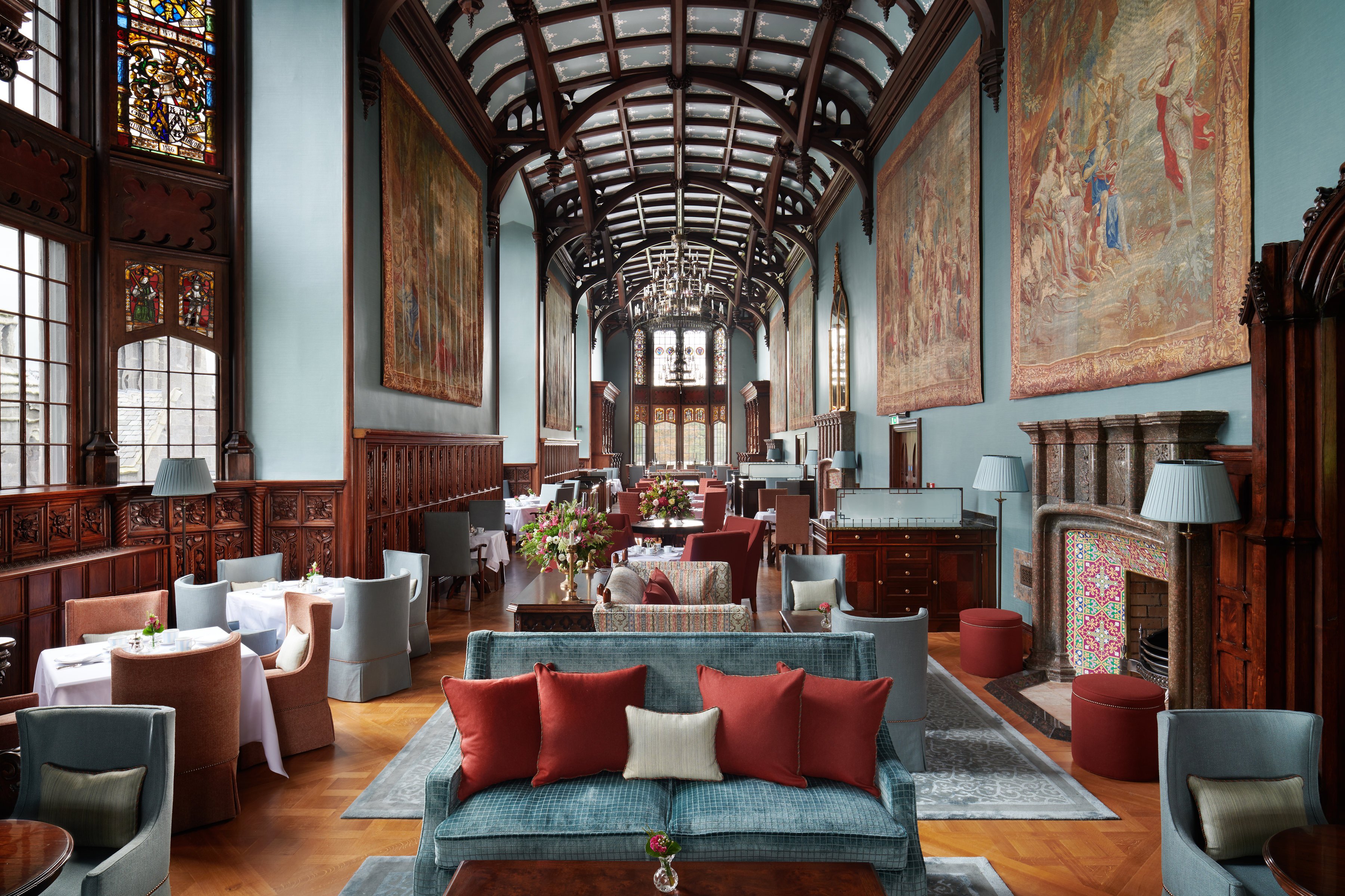 Grand gallery lounge with vaulted ceiling and historic artwork at Adare Manor