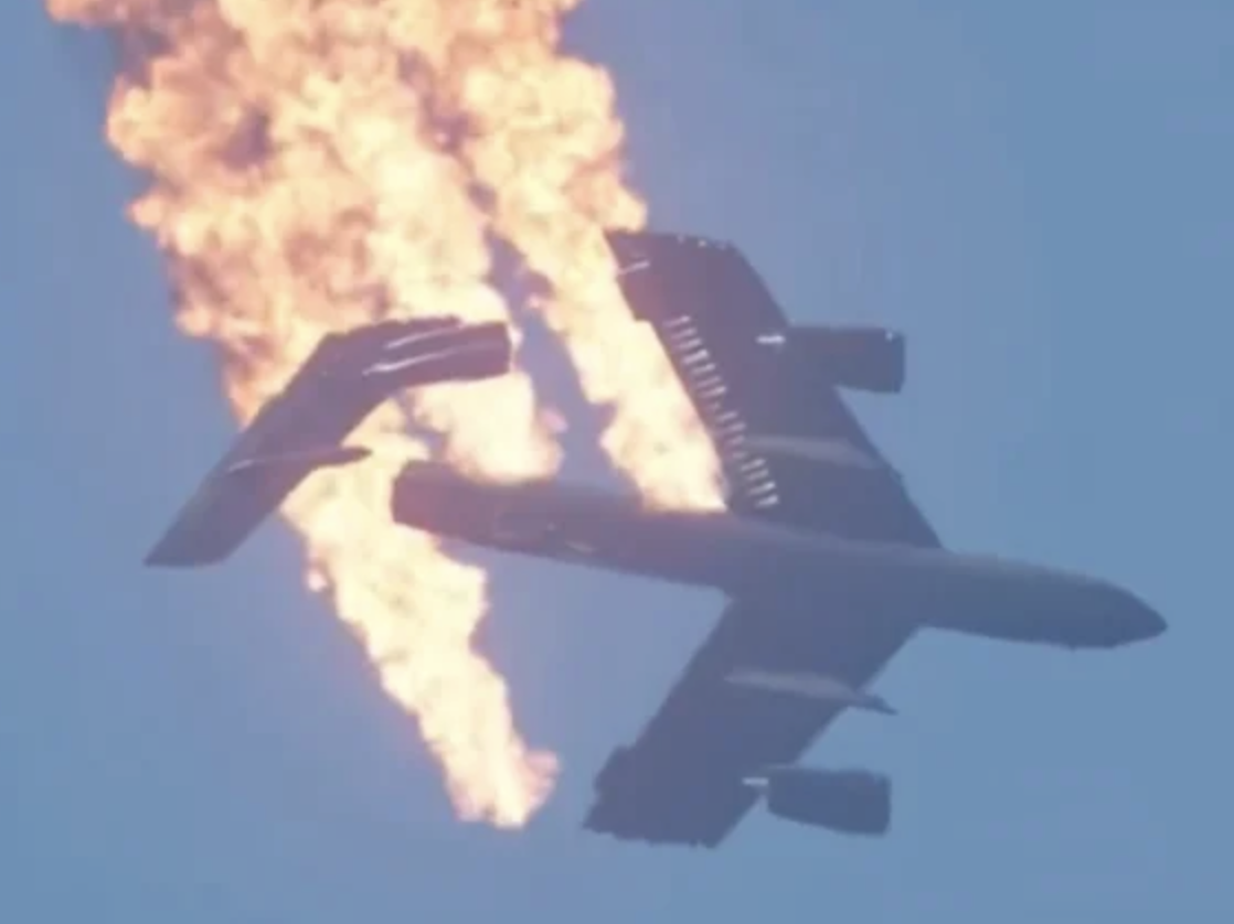 A B-52 bomber breaking apart in clean, unrealistic pieces straight out of a flight simulator