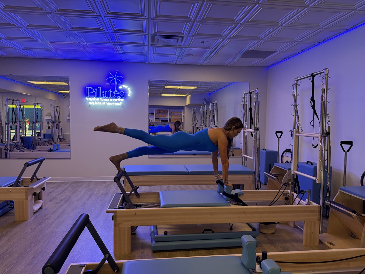 Plank on the reformer at Pilates at The Palms in Boca Raton