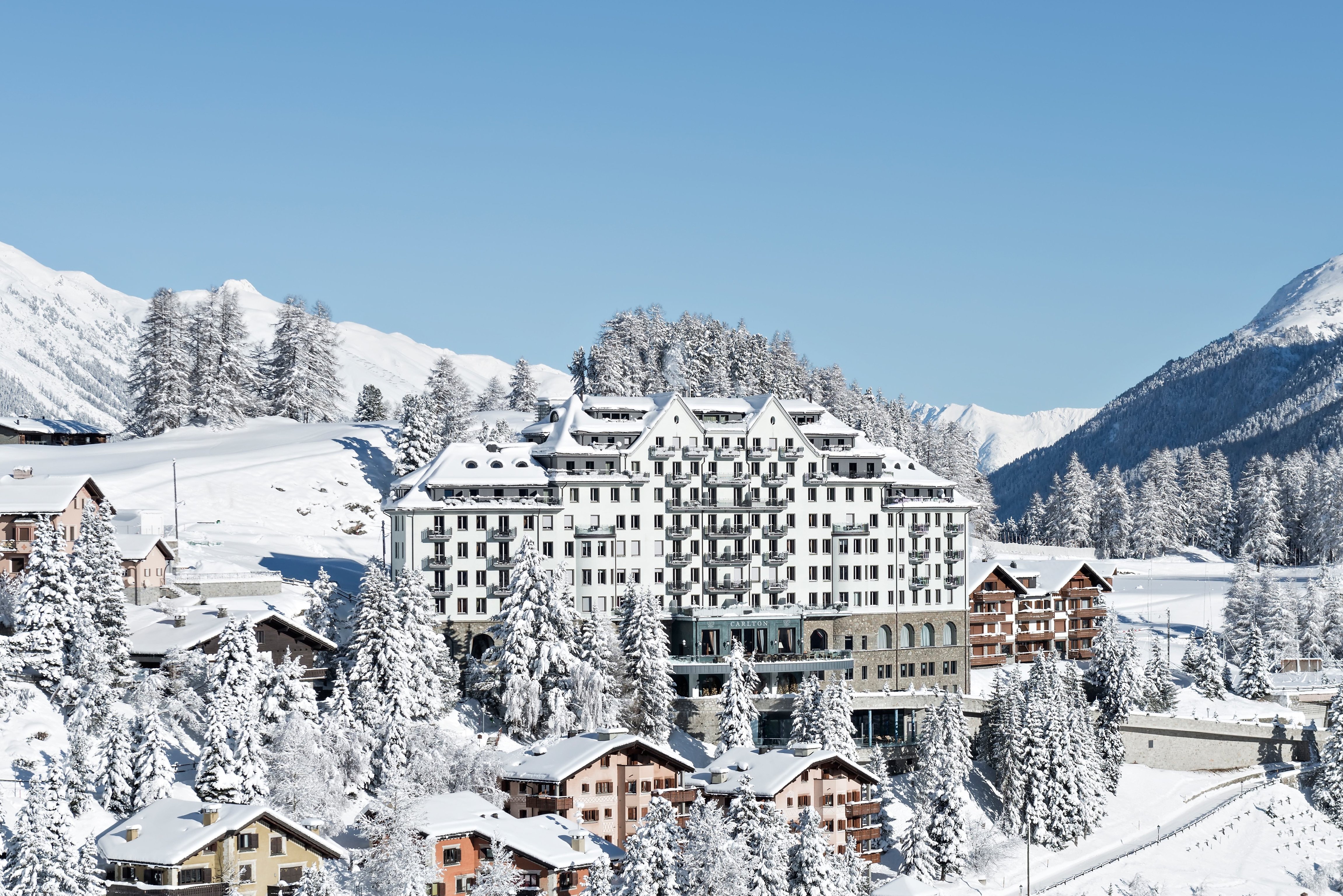 Carlton Hotel St. Moritz above the snow-covered town