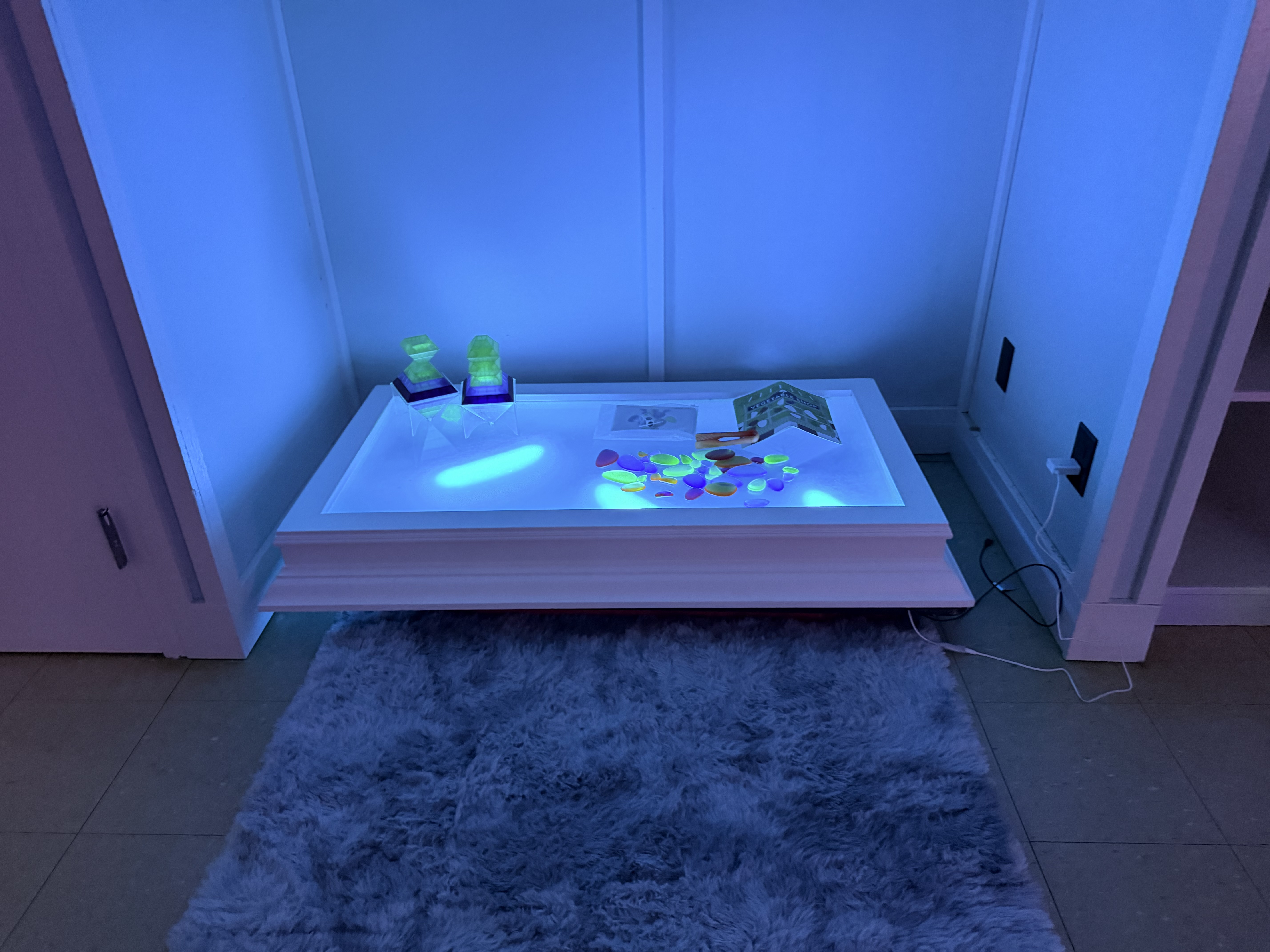 Light-up sensory board at Camp Jump Start Autism Adventure