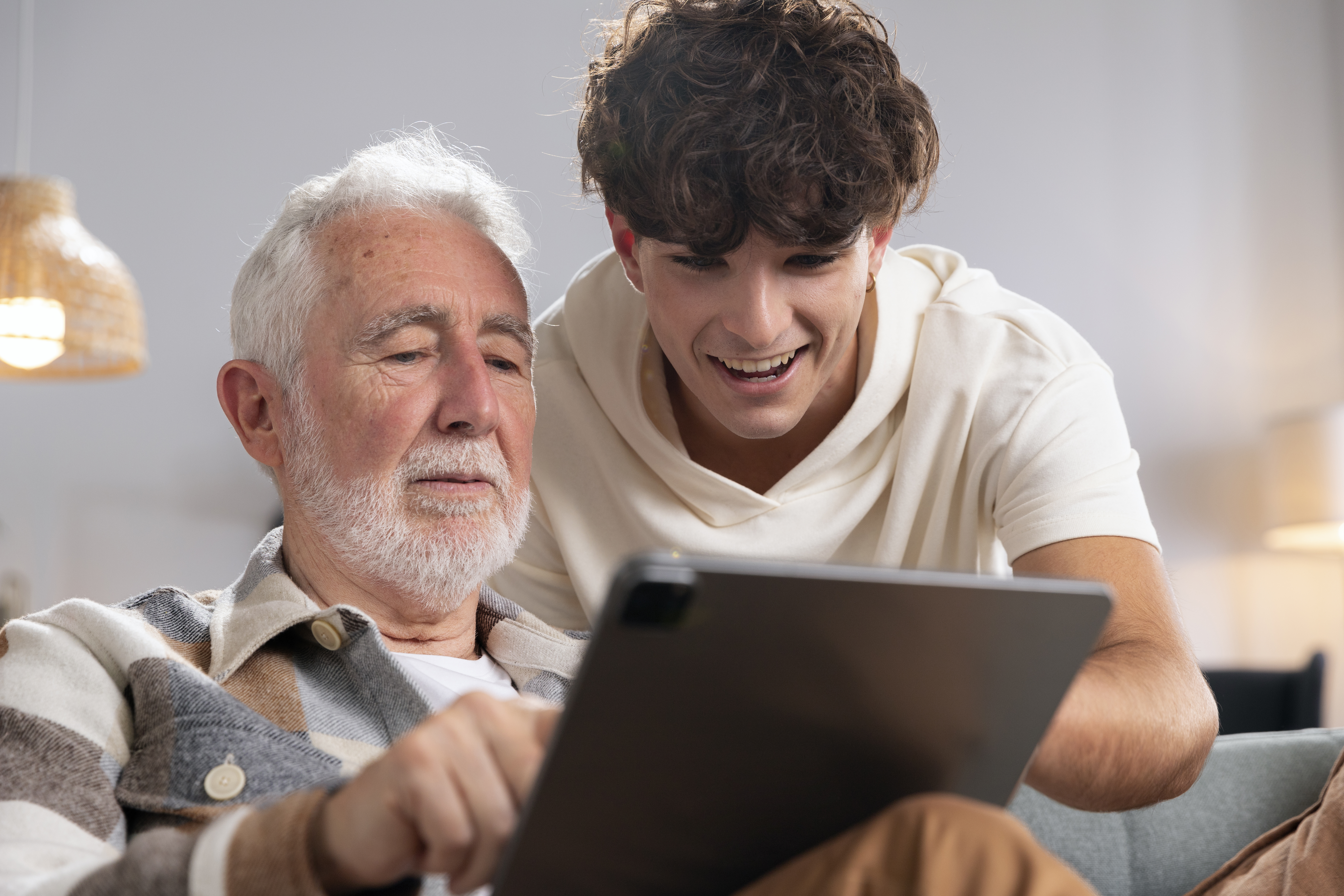 Grandparent and grandchild answering questions together
