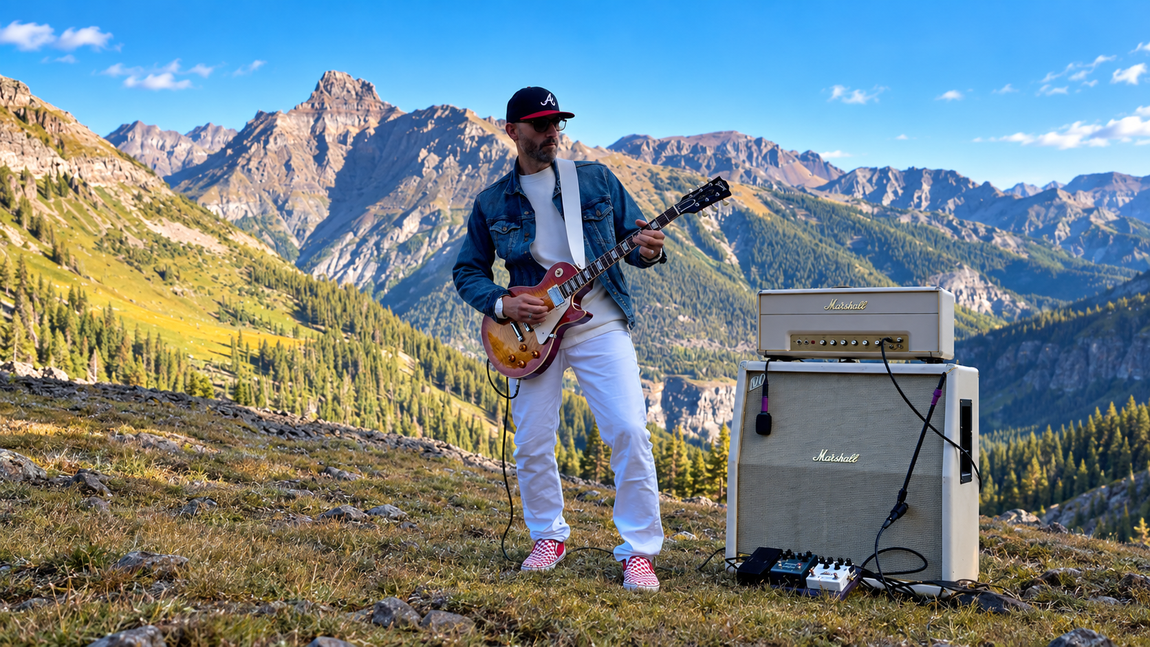 Andrew Suggs playing guitar in Colorado.