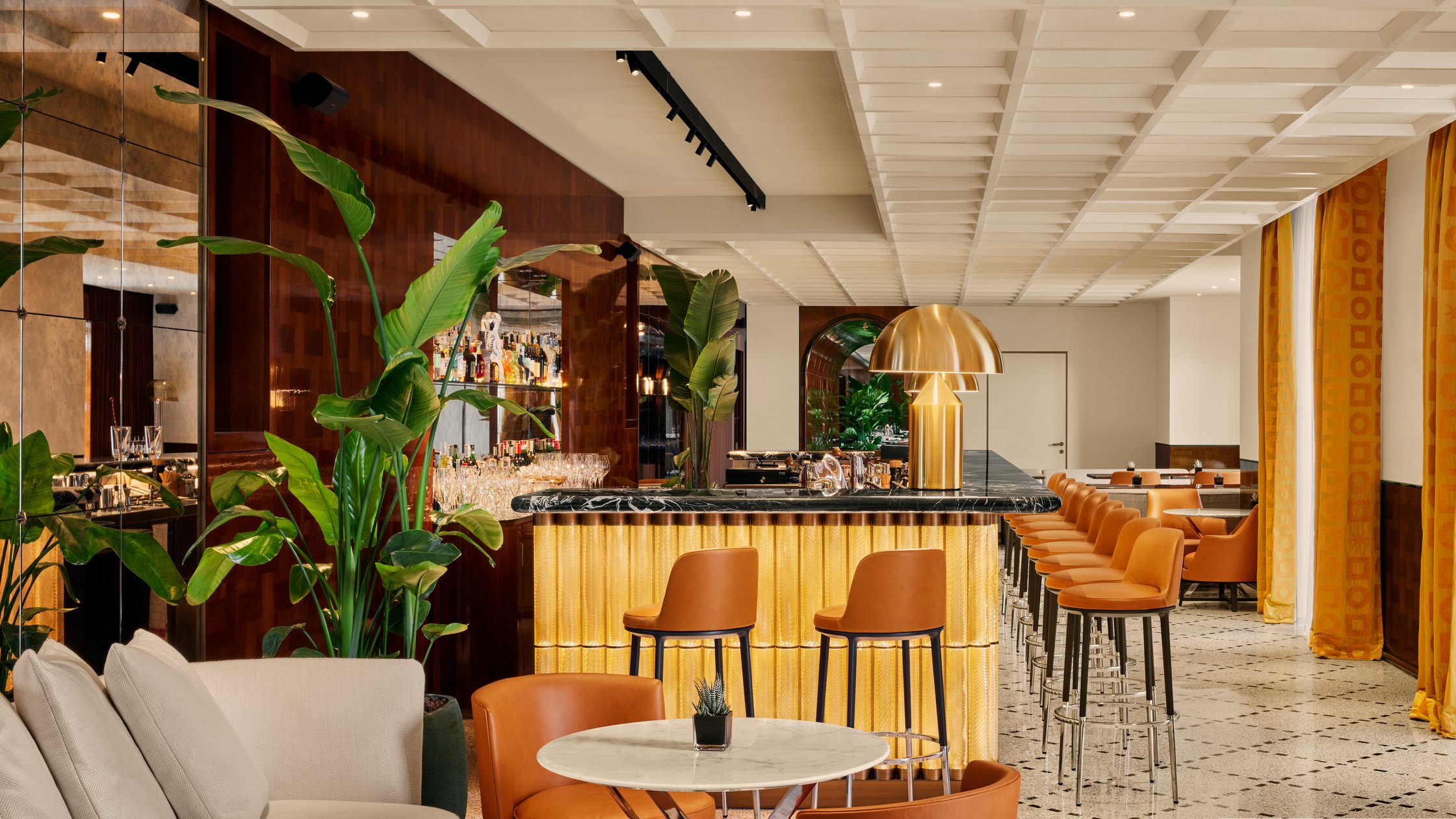 Bar seating and plants at Bvlgari Hotel Roma