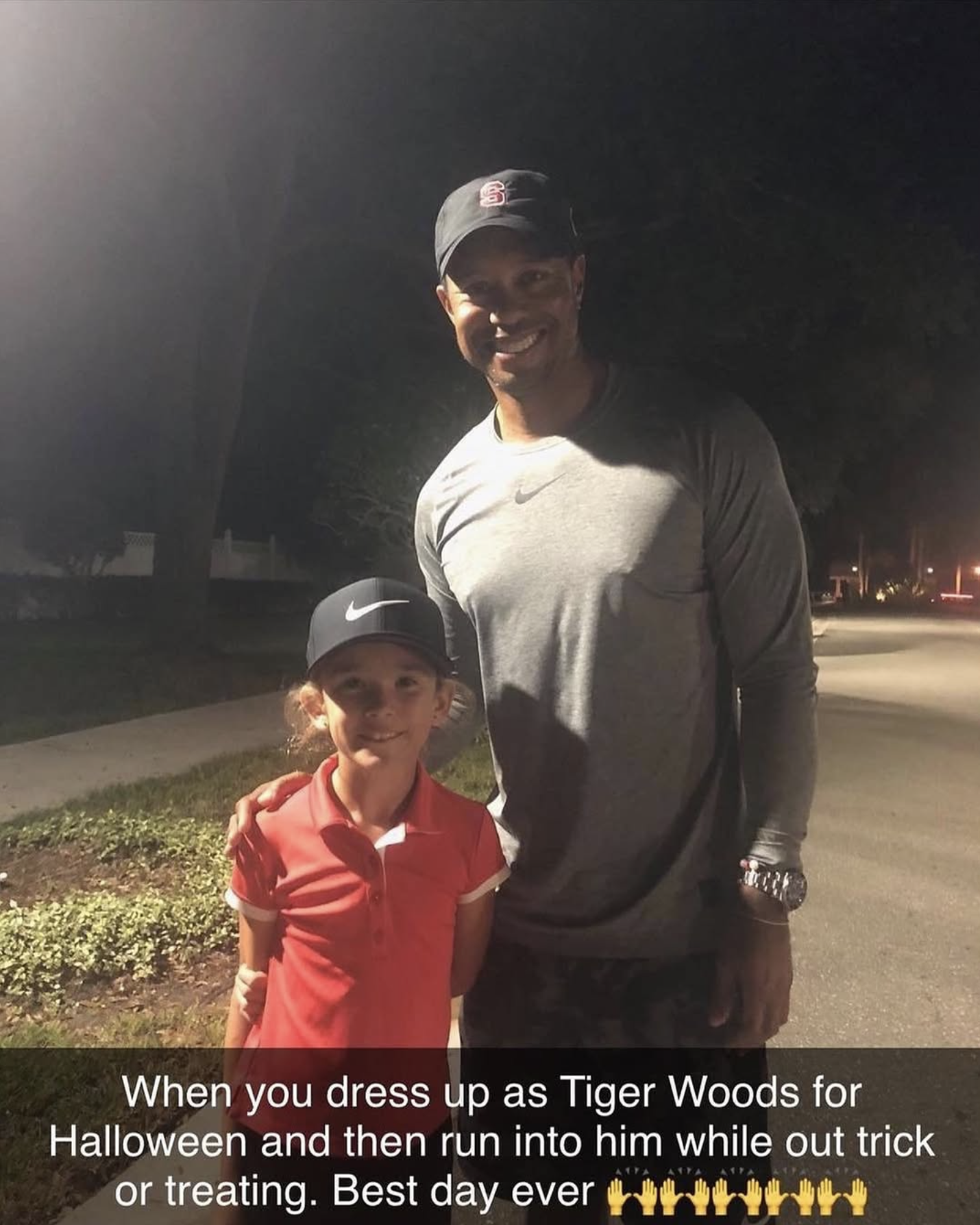 Kid dressed as Tiger Woods meets Tiger Woods on Halloween