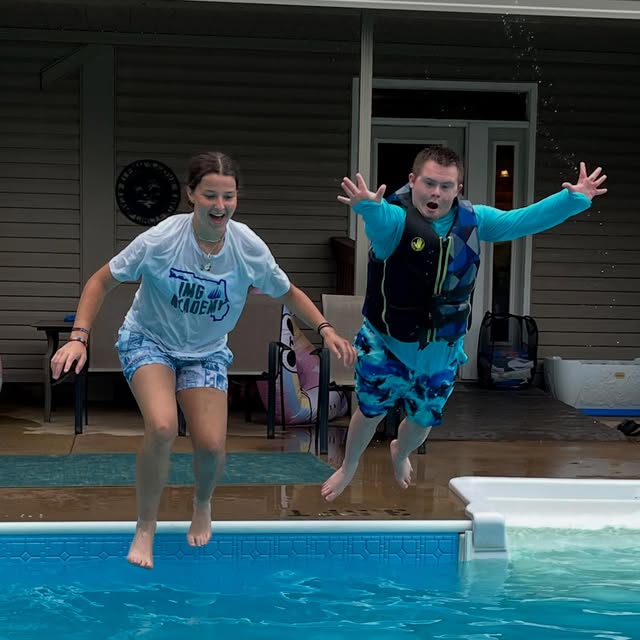 Camp Circle Star campers jumping into the pool