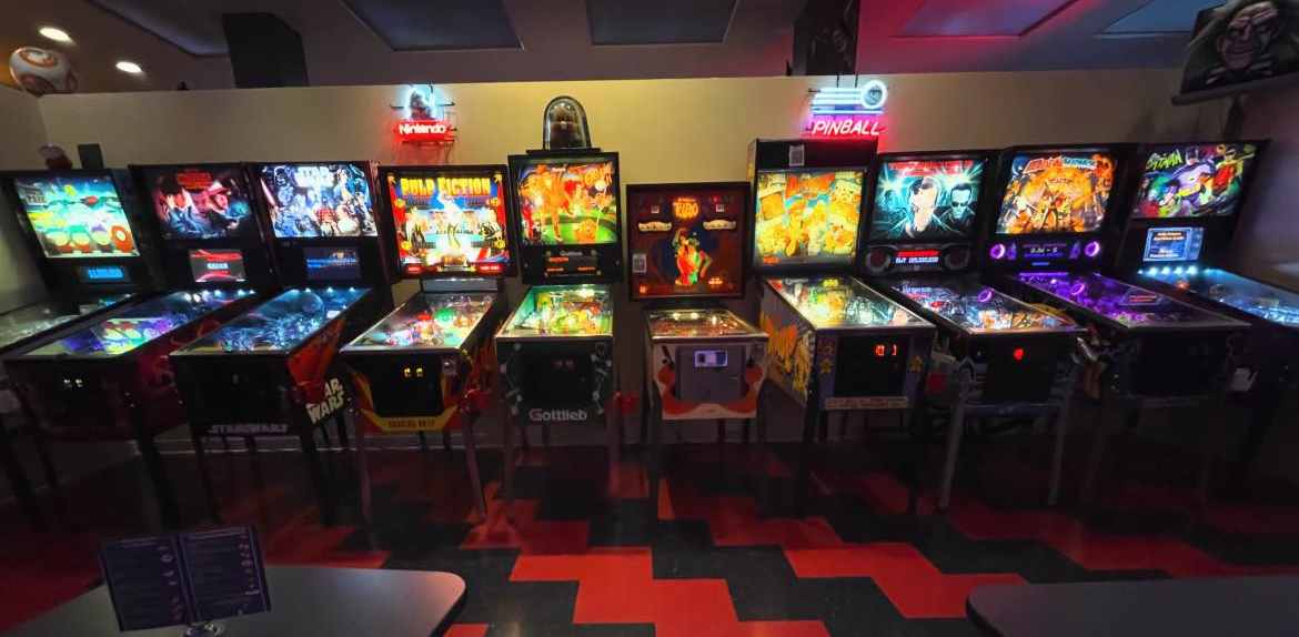 Pinball machines lined up inside High Score Saloon in downtown Evansville
