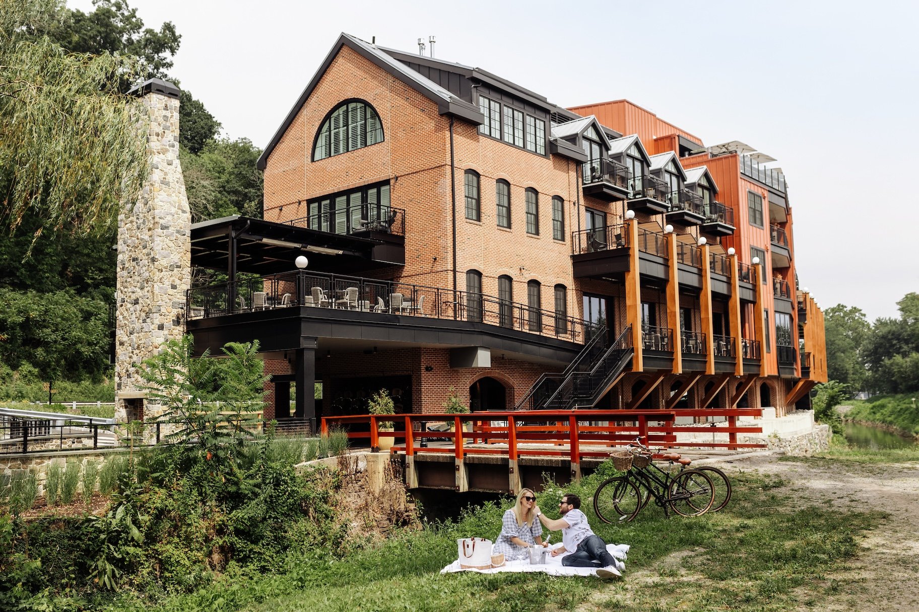 Riverside exterior of The River House at Odette’s