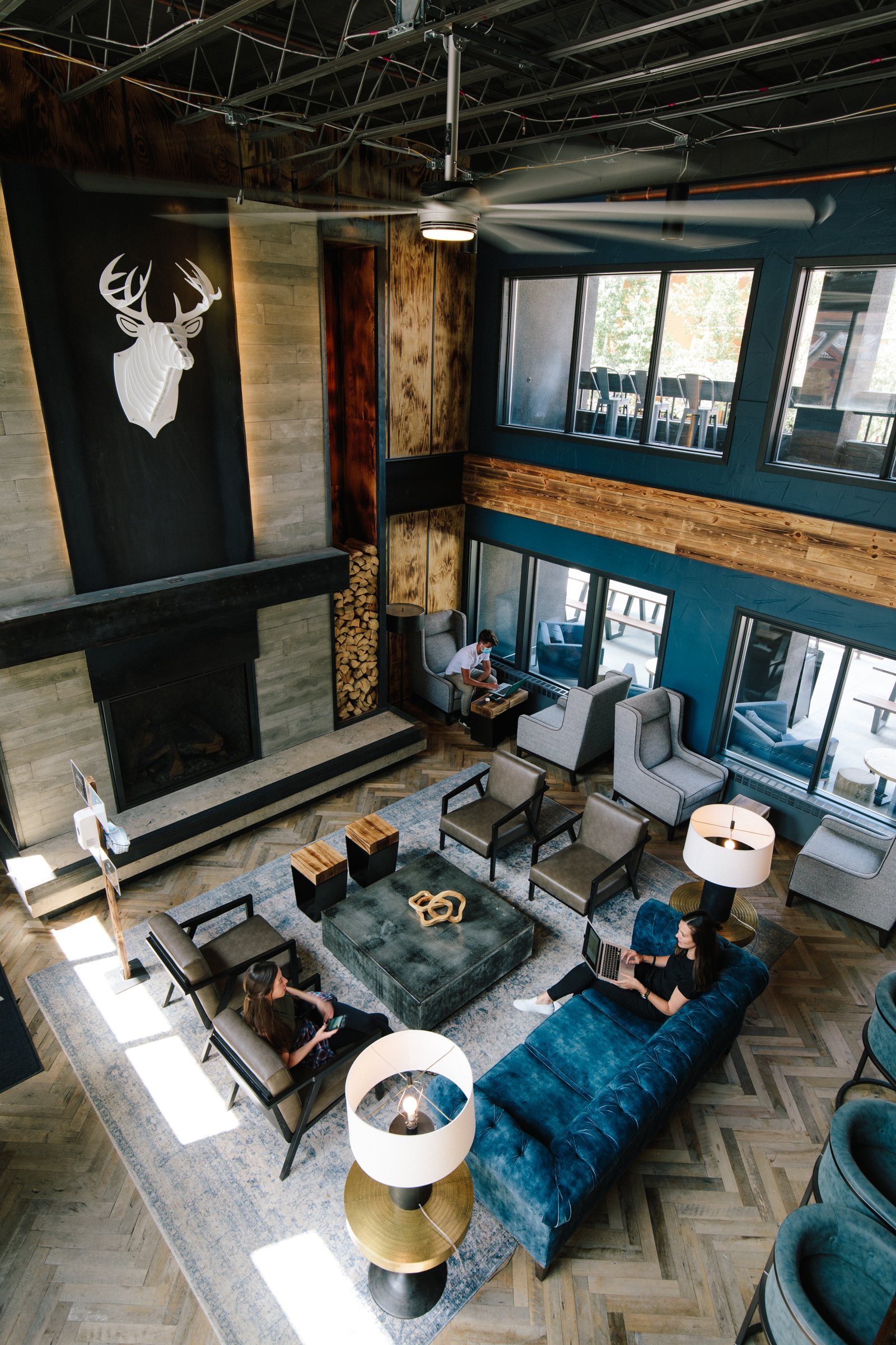 Two-story mountain lodge lounge at Gravity Haus Breckenridge