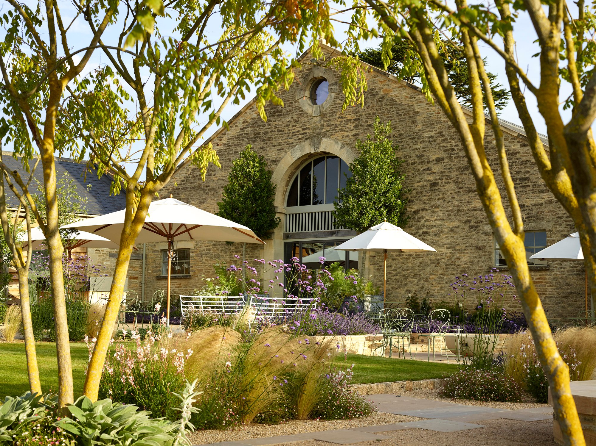 Stone barn and gardens at Thyme in the Cotswolds