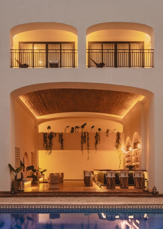 Illuminated arches beside the pool at Tropicana Los Cabos